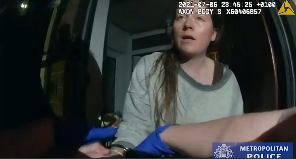 Moment officers arrest Mitchell on her doorstep in London