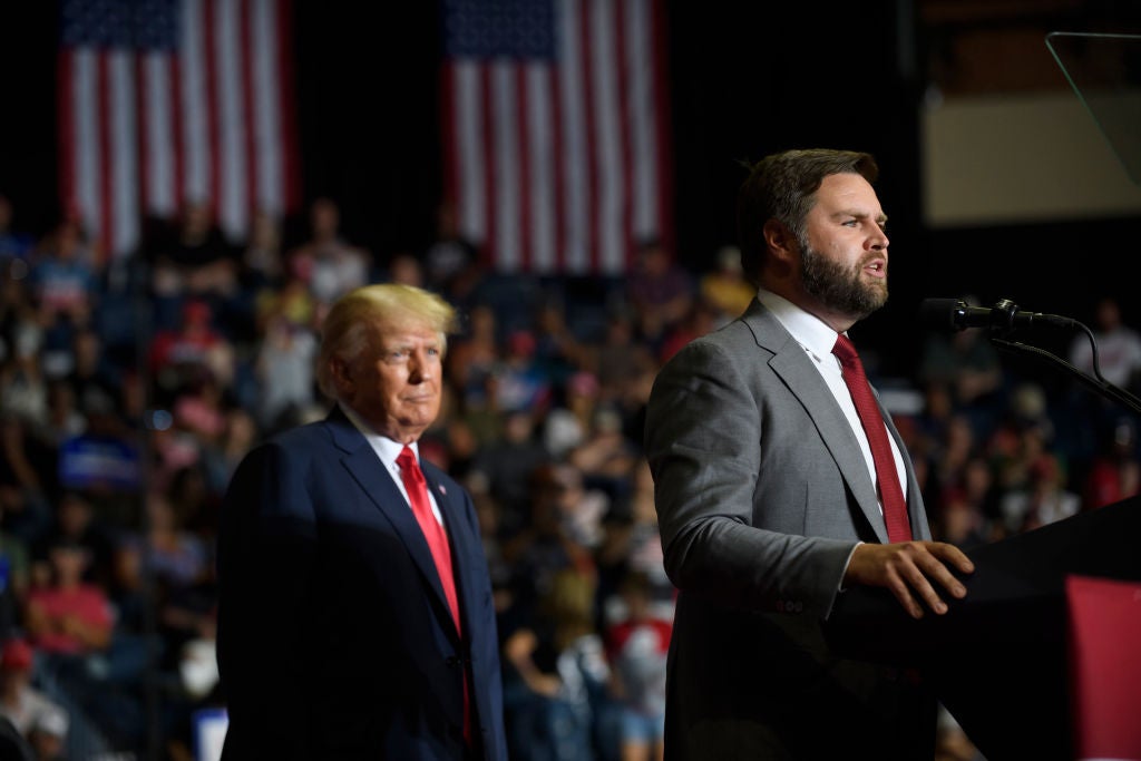 Donald Trump watches approvingly as his endorsed Senate hopeful JD Vance speaks in Youngstown, Ohio