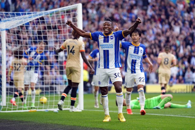 <p>Brighton’s Pervis Estupinan celebrates after his cross was turned into his own net by Chelsea defender Trevoh Chalobah </p>