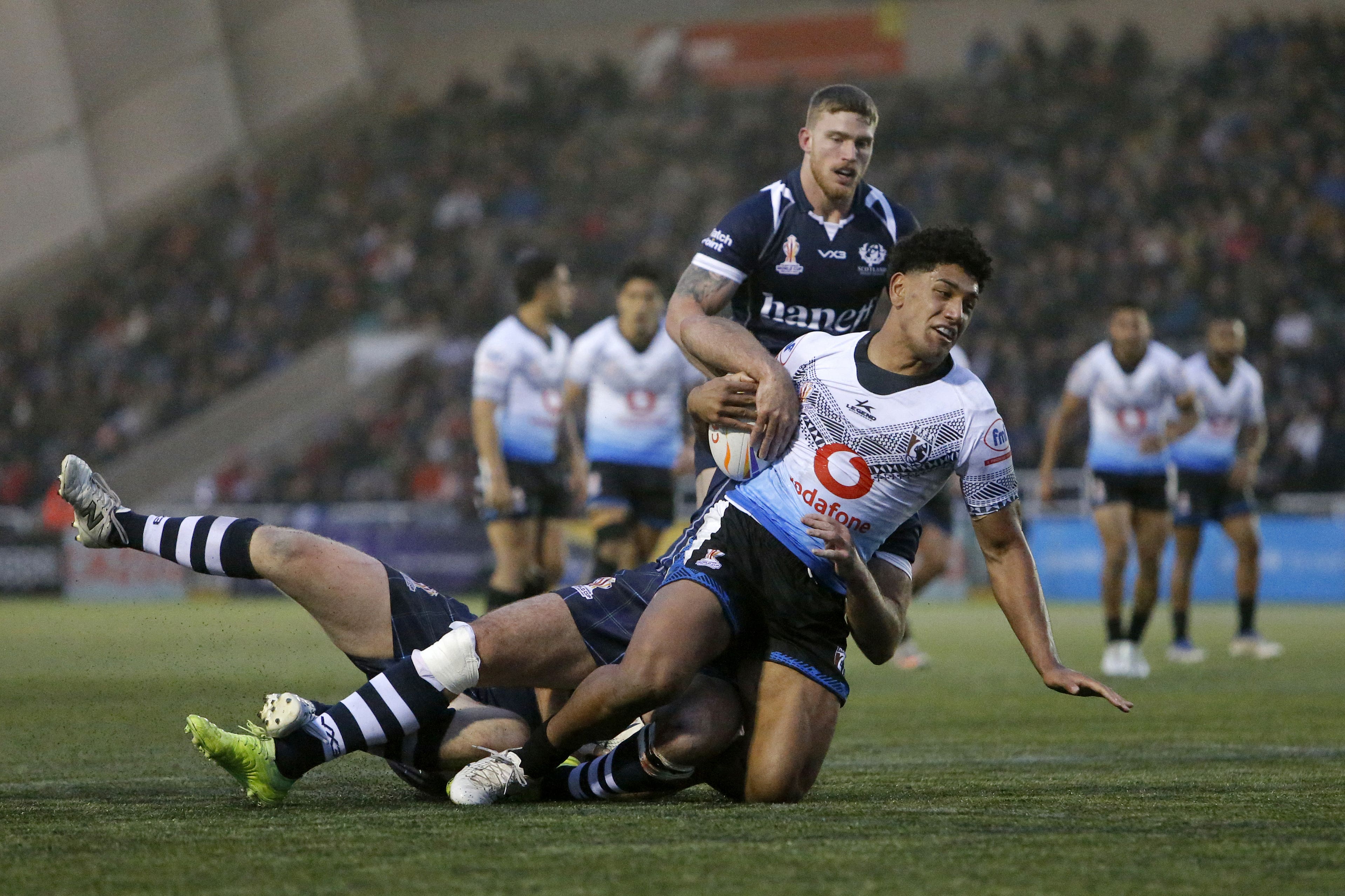 Fiji’s Josh Wong is tackled during the match against Scotland (Will Matthews/PA).