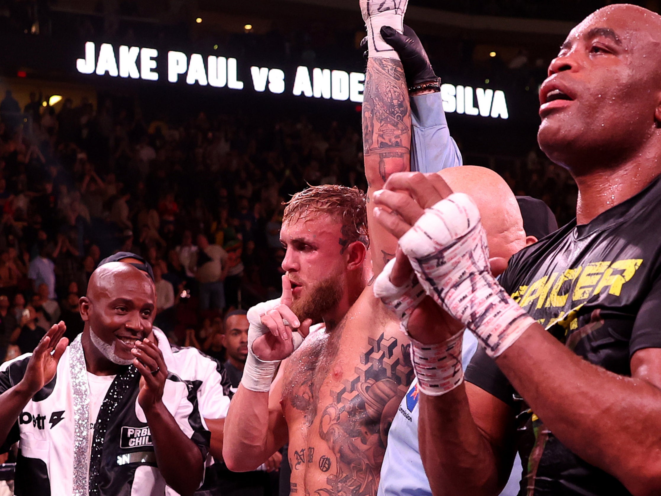 Jake Paul (centre) beat Anderson Silva on all three judges’ scorecards