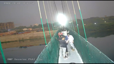 Video shows people ‘deliberately shaking’ India bridge moments before collapse that killed 141