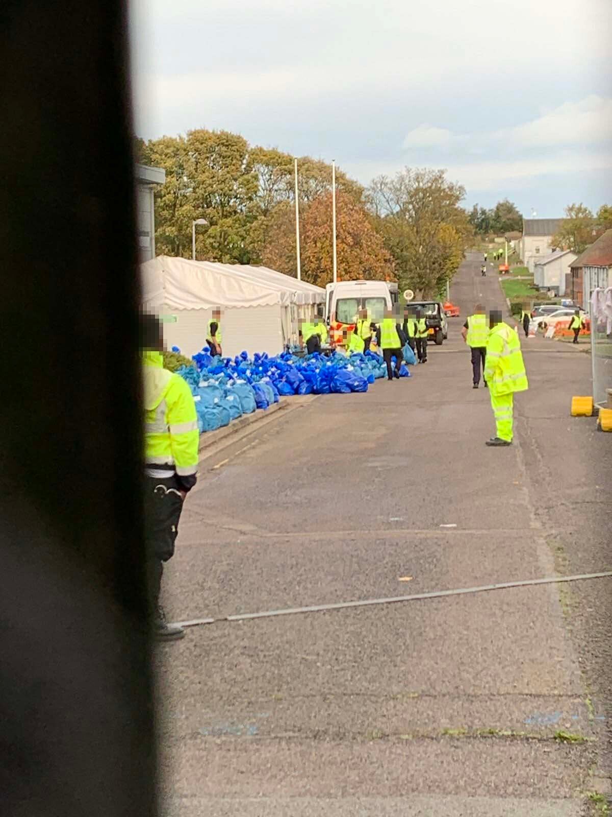 The belongings of refugees were gathered into big blue bags at Manston short-stay centre