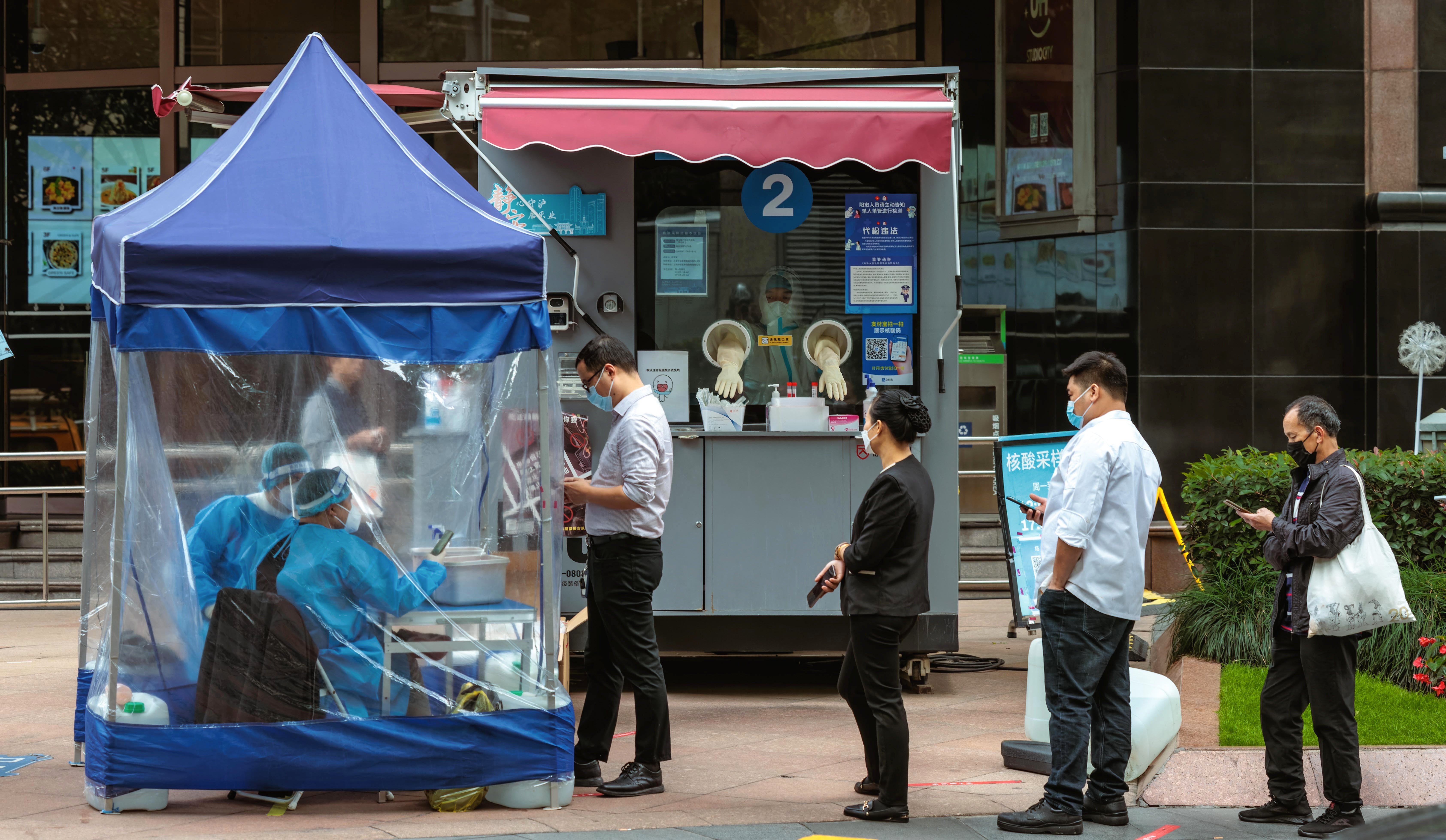 People stand in line for Coronavirus PCR test in Shanghai, China on 28 October