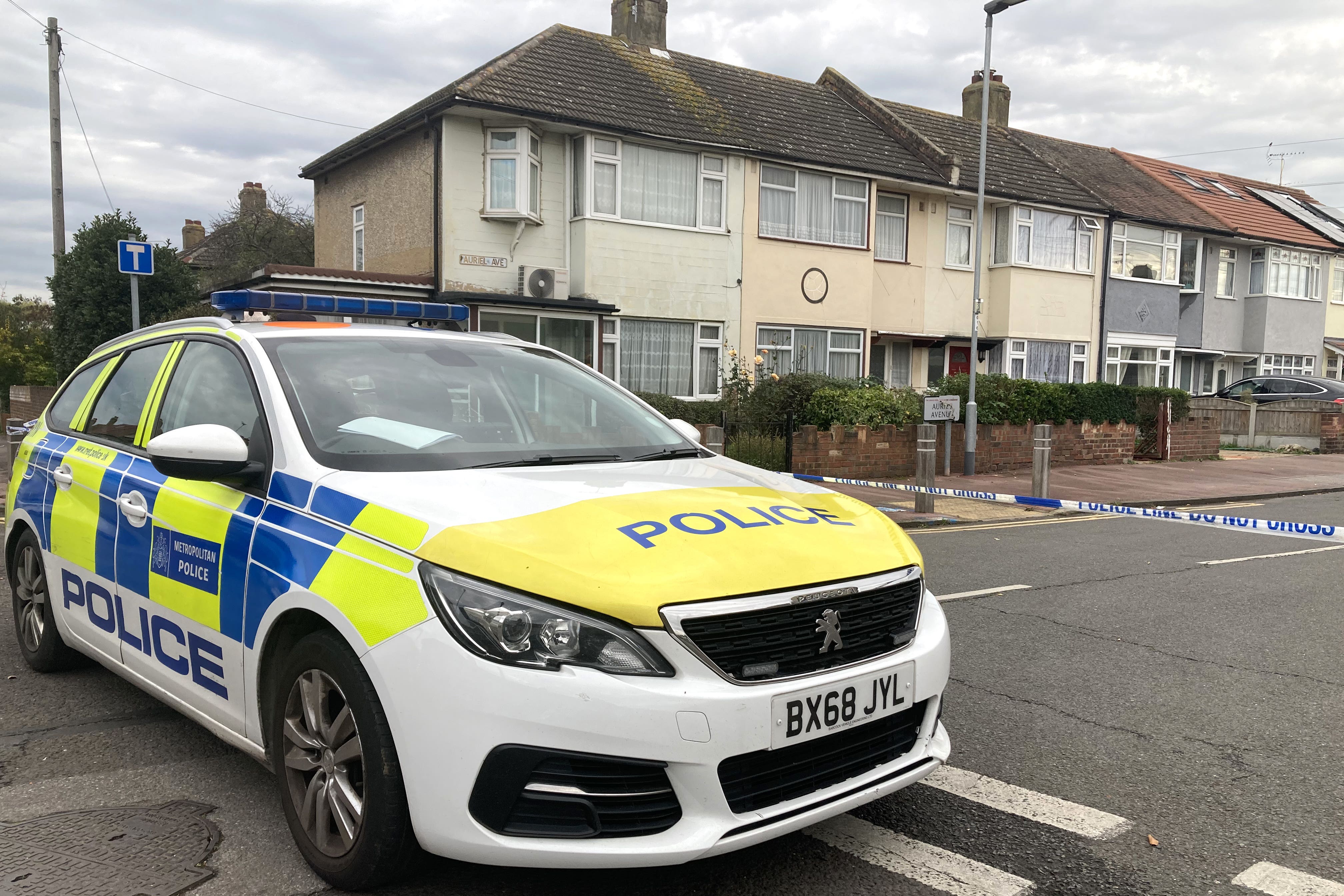 Police at the scene in Auriel Avenue, Dagenham (PA)