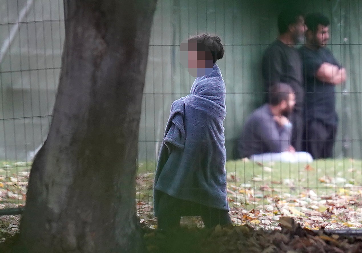 A young boy, thought to be a migrant, inside the Manston immigration short-term holding facility