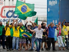 Day of violence feared in Brazil as Bolsonaro supporters block roads over Lula victory