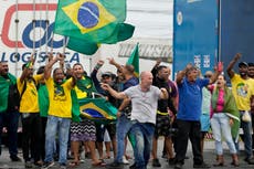 Day of violence feared in Brazil as Bolsonaro supporters block roads over Lula victory