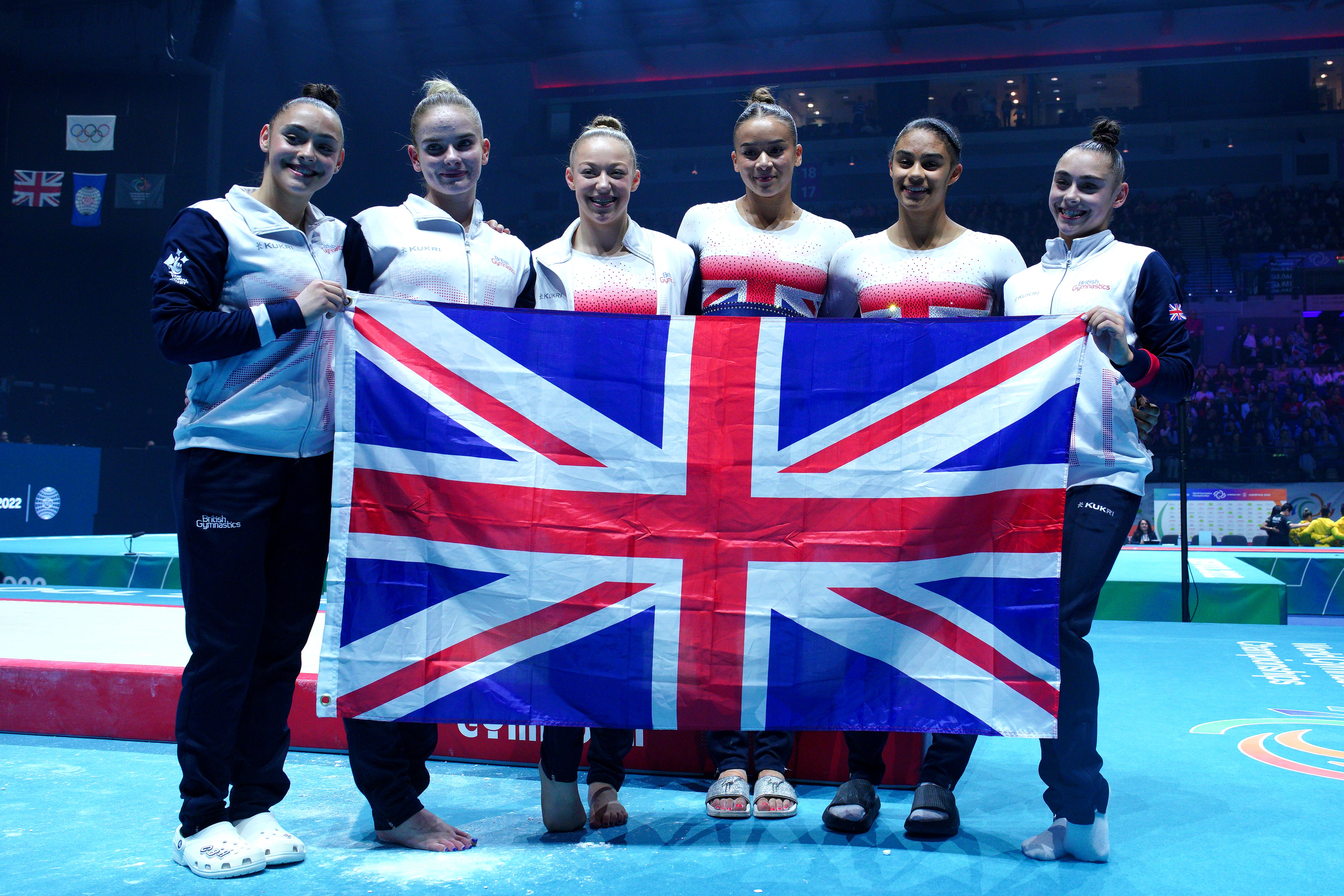 Great Britain’s Alice Kinsella, Jessica Gadirova, Jennifer Gadirova, Georgia Mae Fenton and Ondine Achampong celebrate winning silver in the women’s team final at the World Gymnastics Championships (Peter Byrne/PA)