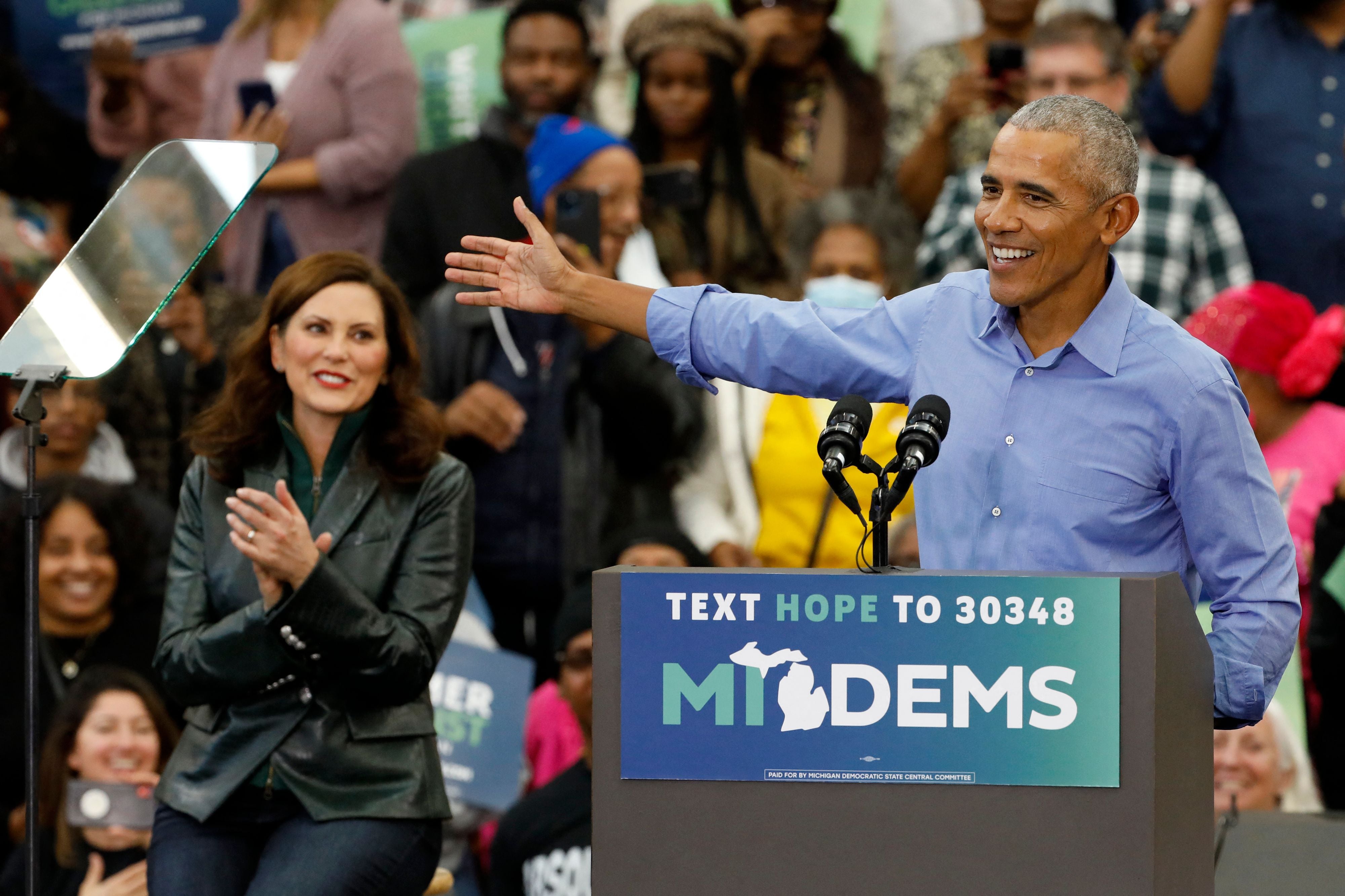 Former US President Barack Obama campaigns for Michigan Governor Gretchen Whitmer (L) during a "Get Out the Vote Rally" ahead of the midterm elections,at Renaissance High School in Detroit, Michigan, on October 29, 2022.