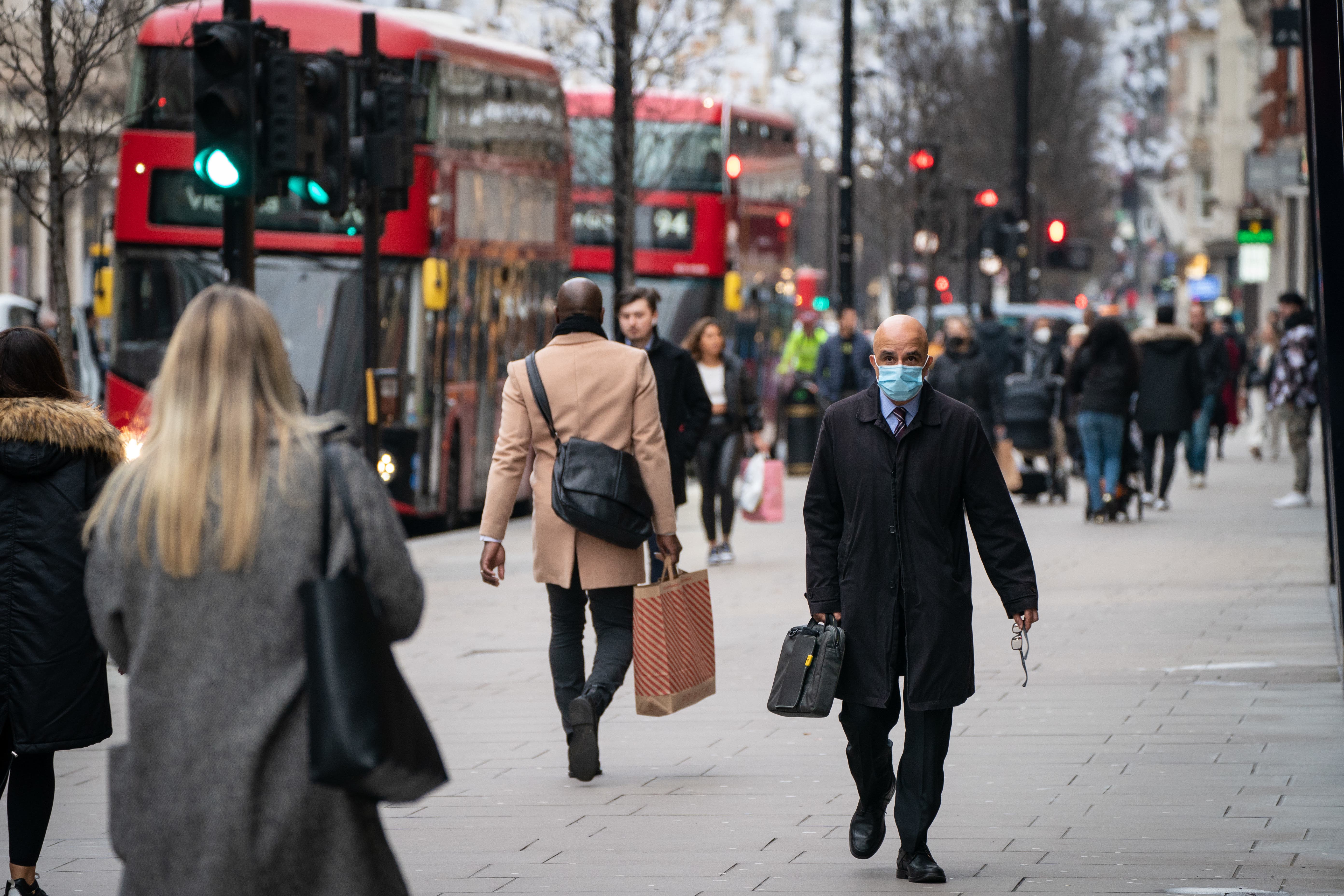 People on Oxford Street, in central London (PA)