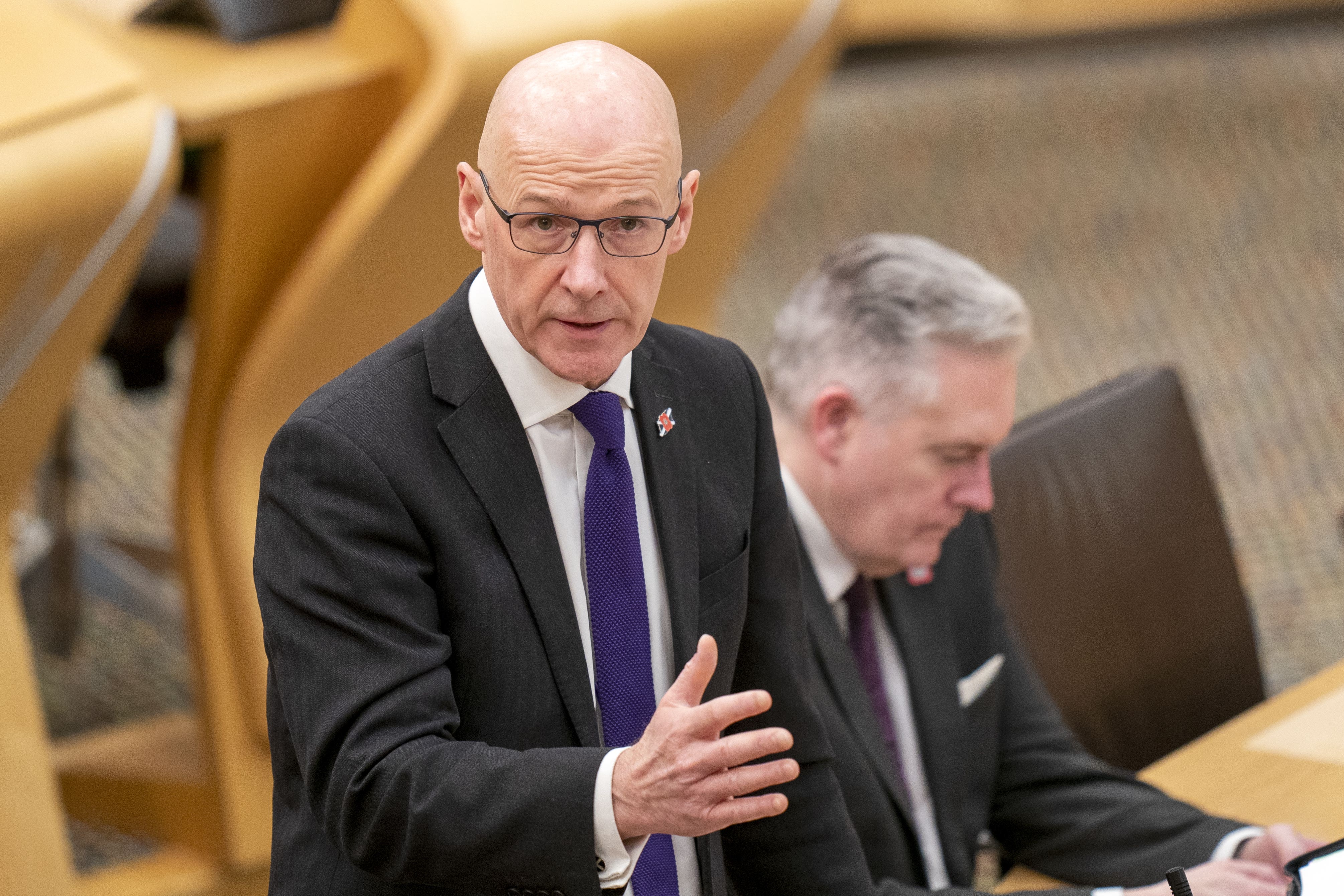 John Swinney has published his emergency budget review (Jane Barlow/PA)