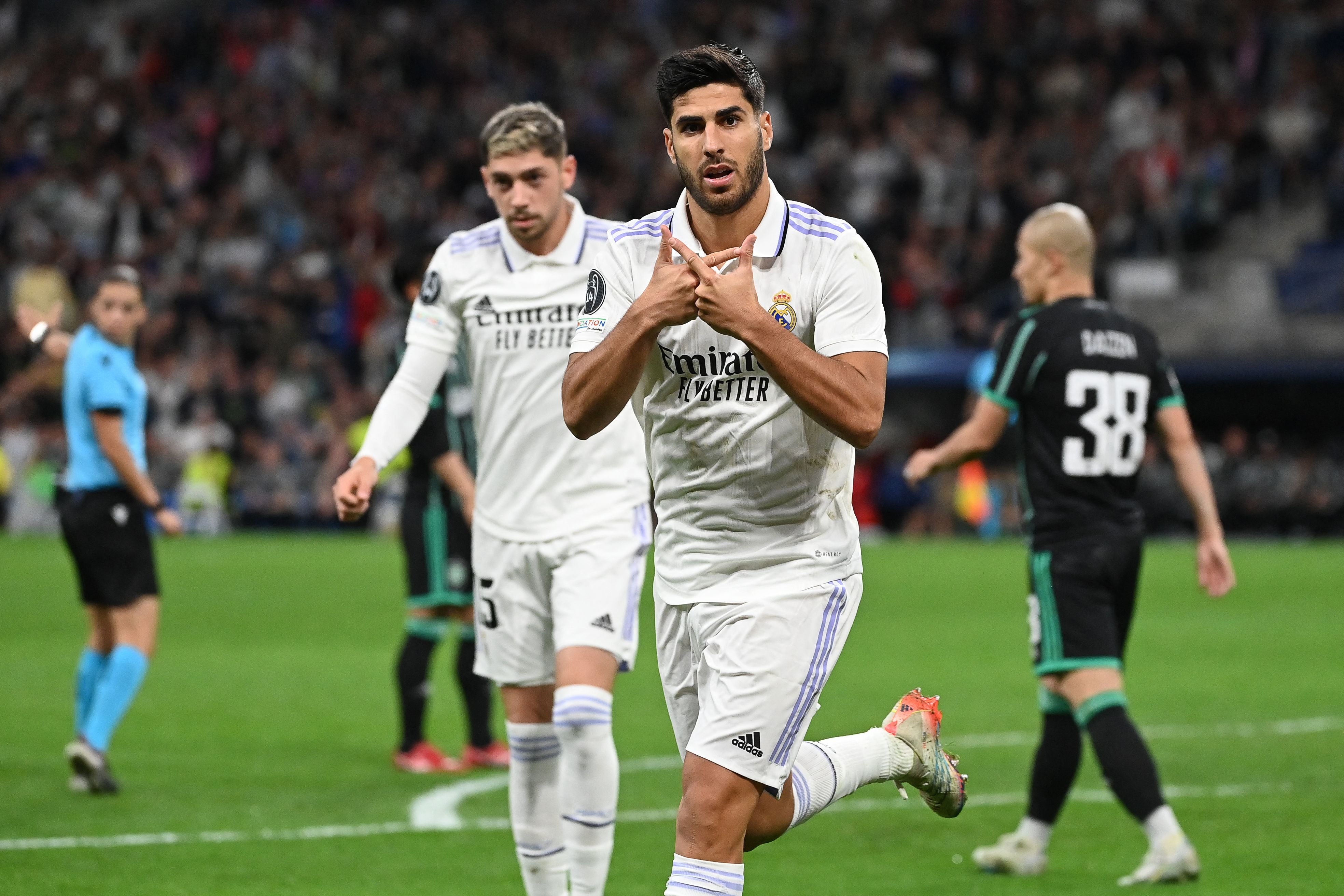 Marco Asensio celebrates after scoring Real Madrid’s fourth goal