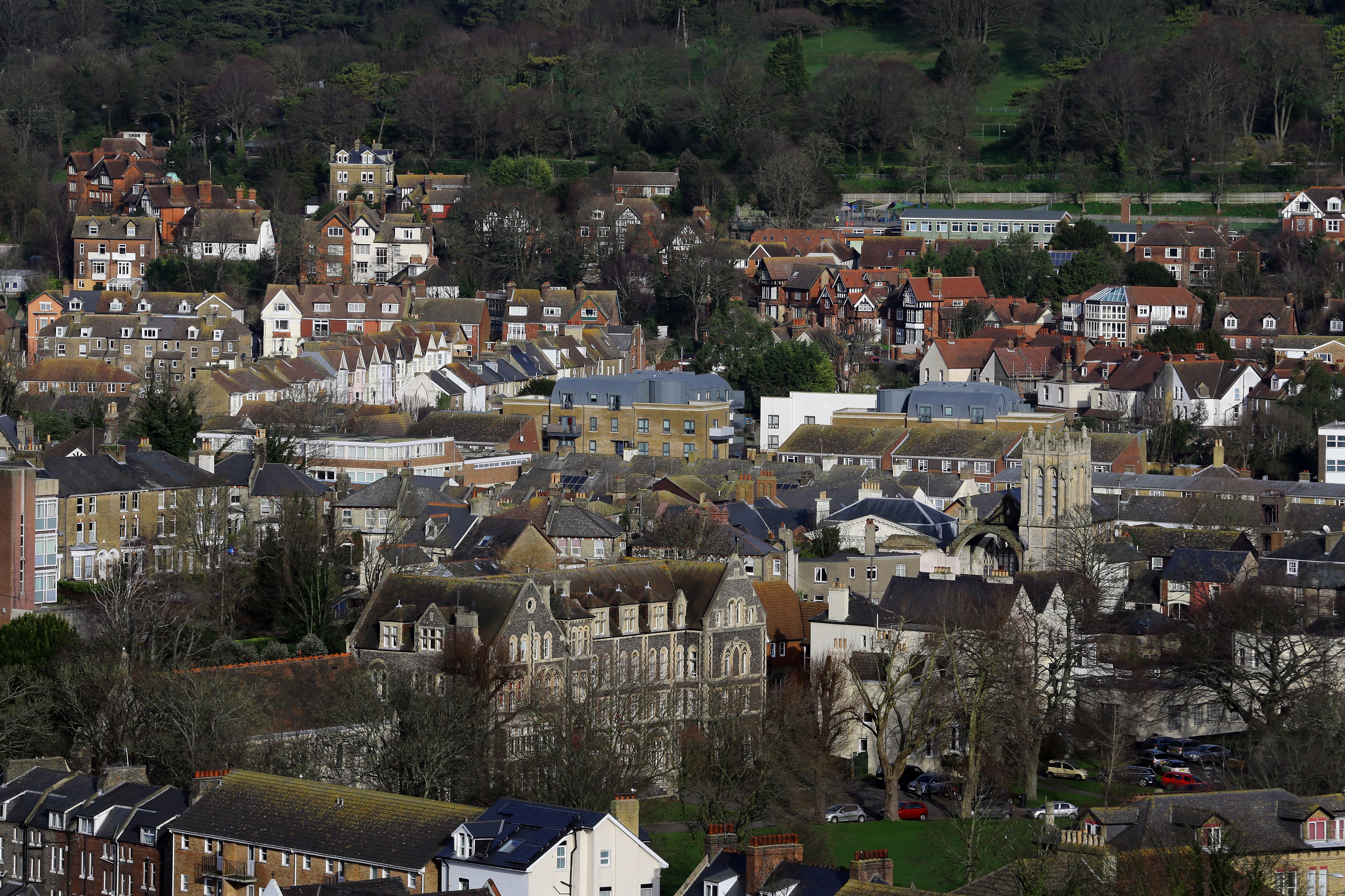 The predictions, made by Savills, assume that house prices will start to recover from 2024 (Gareth Fuller/PA)