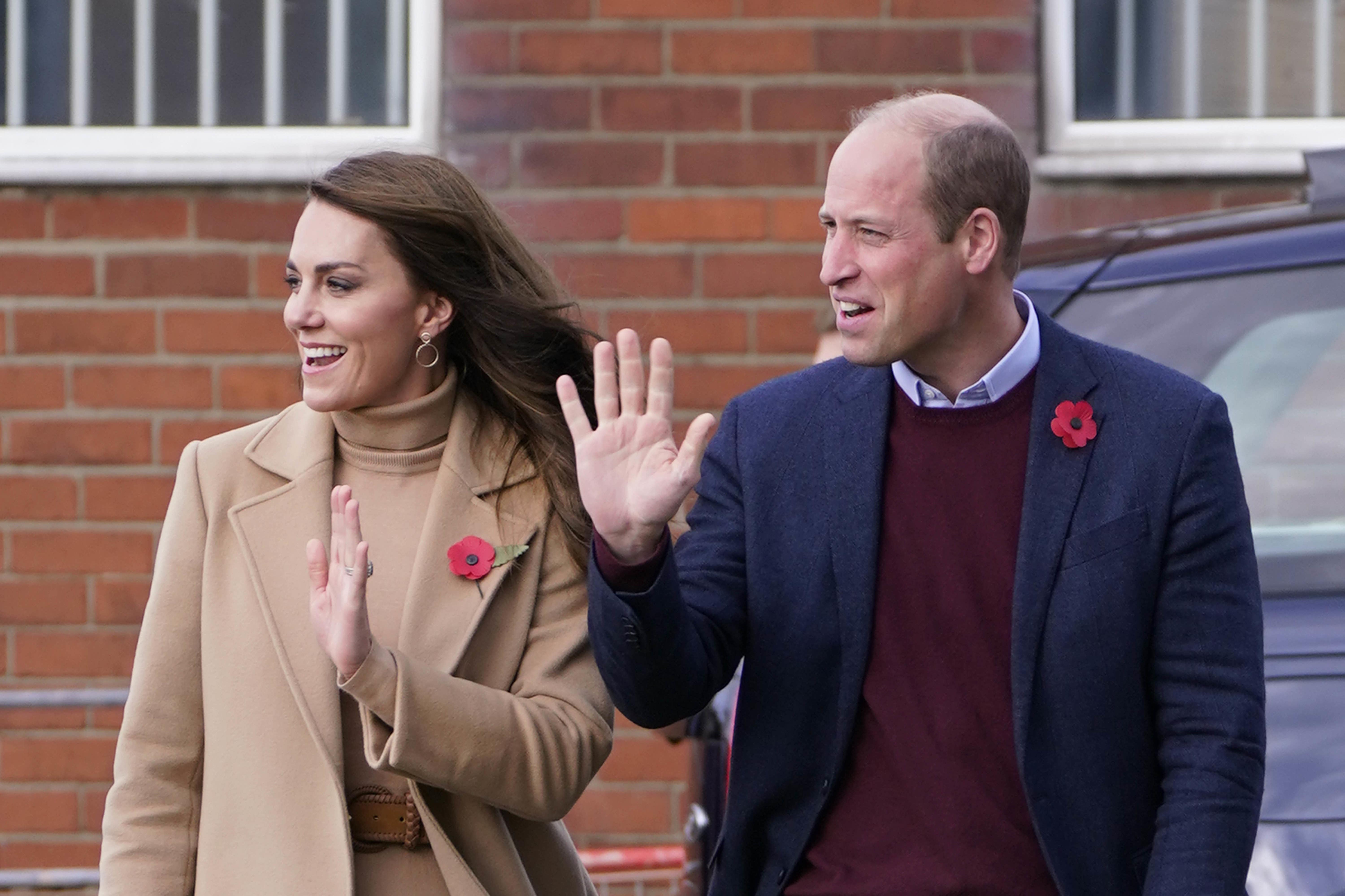 The Prince and Princess of Wales being greeted by a cheering crowd (Danny Lawson/PA)