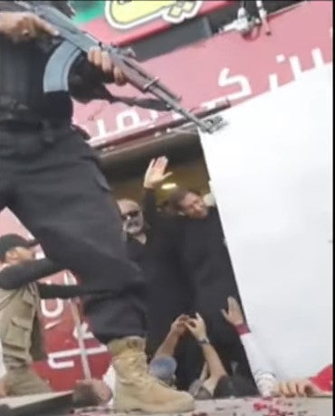 Mr Khan is seen waving in video footage of the aftermath as he is taken to hospital in Lahore