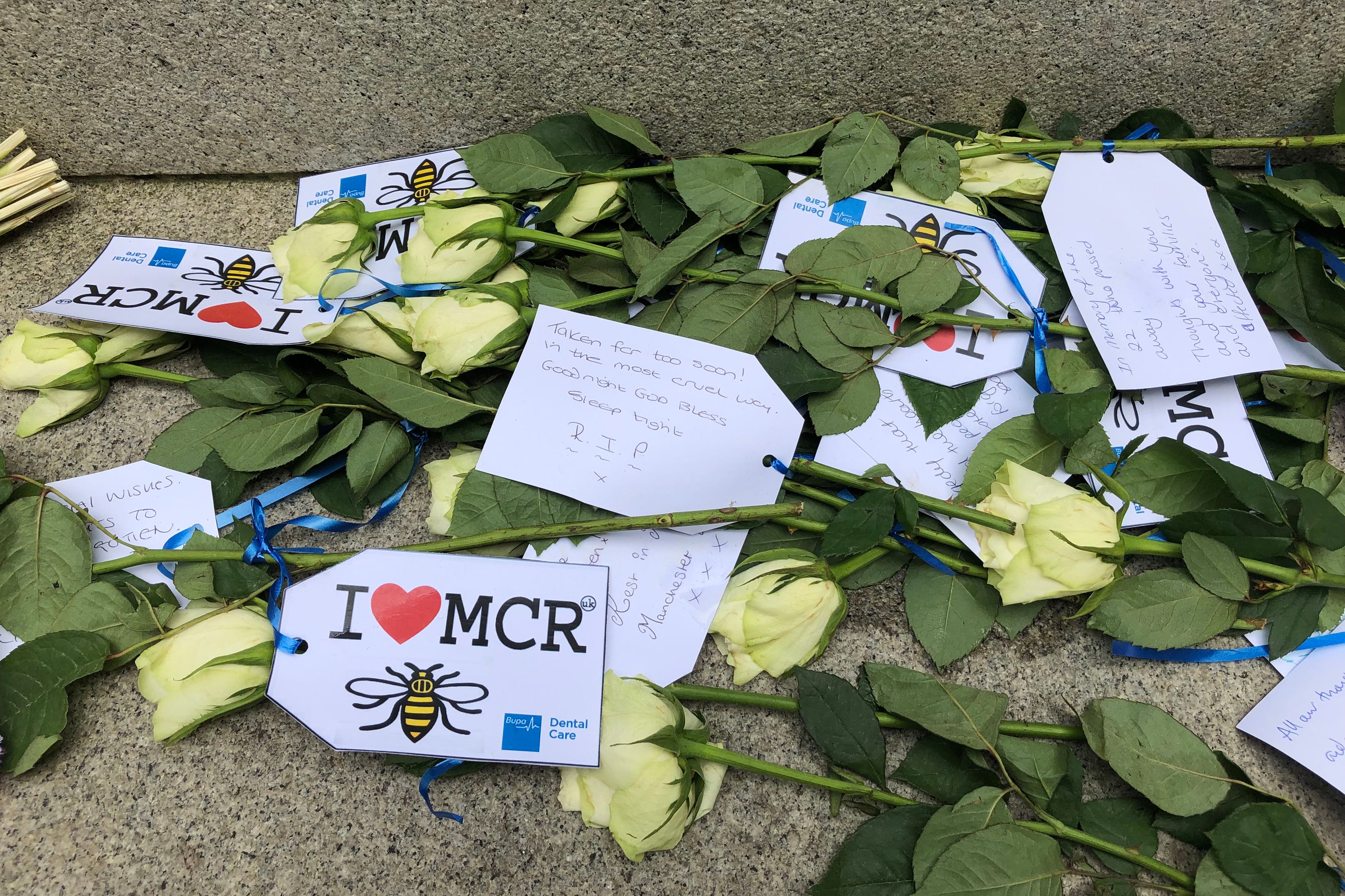 Floral tributes left in St Ann’s Square in Manchester city centre to remember the attack (PA)