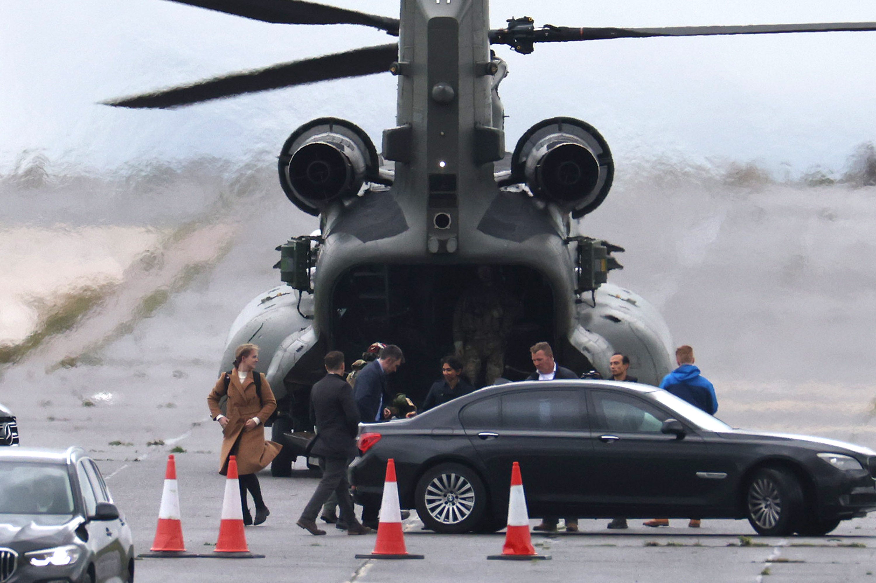 The home secretary was transferred to a BMW car on her arrival at the site