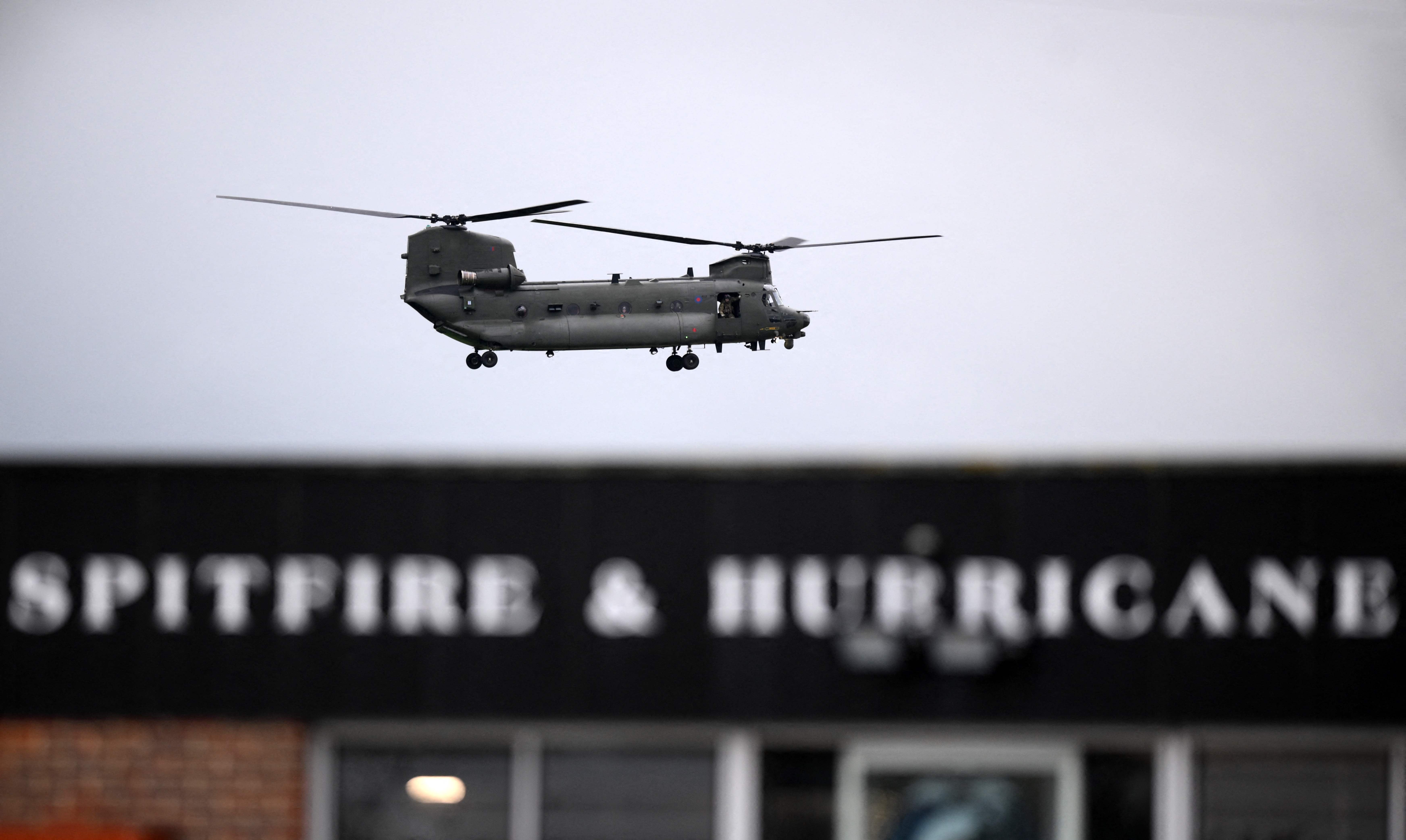 The home secretary arrived at Manston by helicopter after a visit to Dover