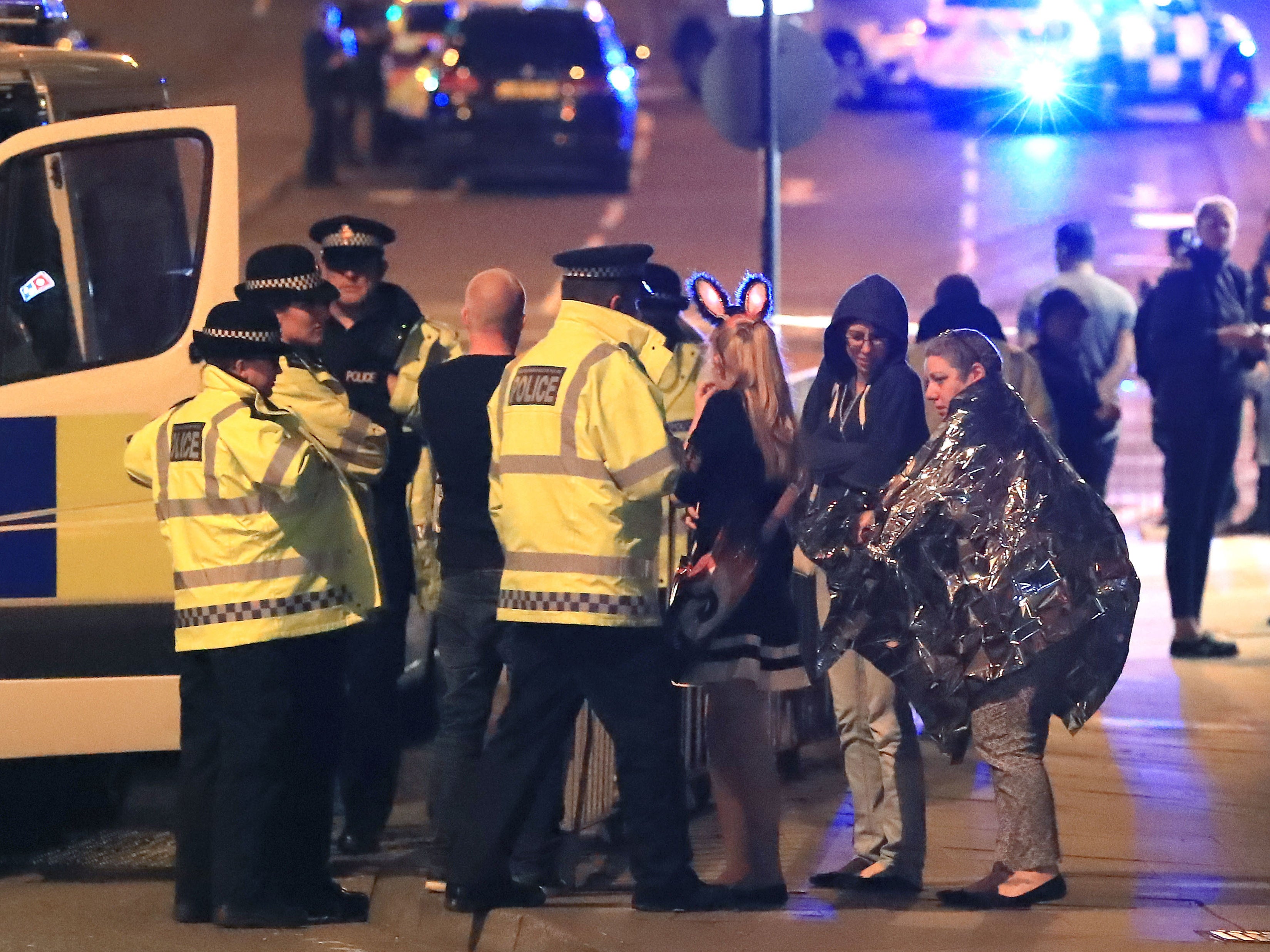 Police at the arena after the bombing