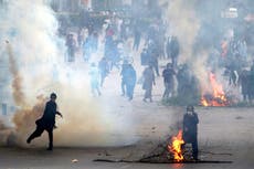 Imran Khan’s bodyguard hit by six bullets in Wazirabad attack as protesters clash with police