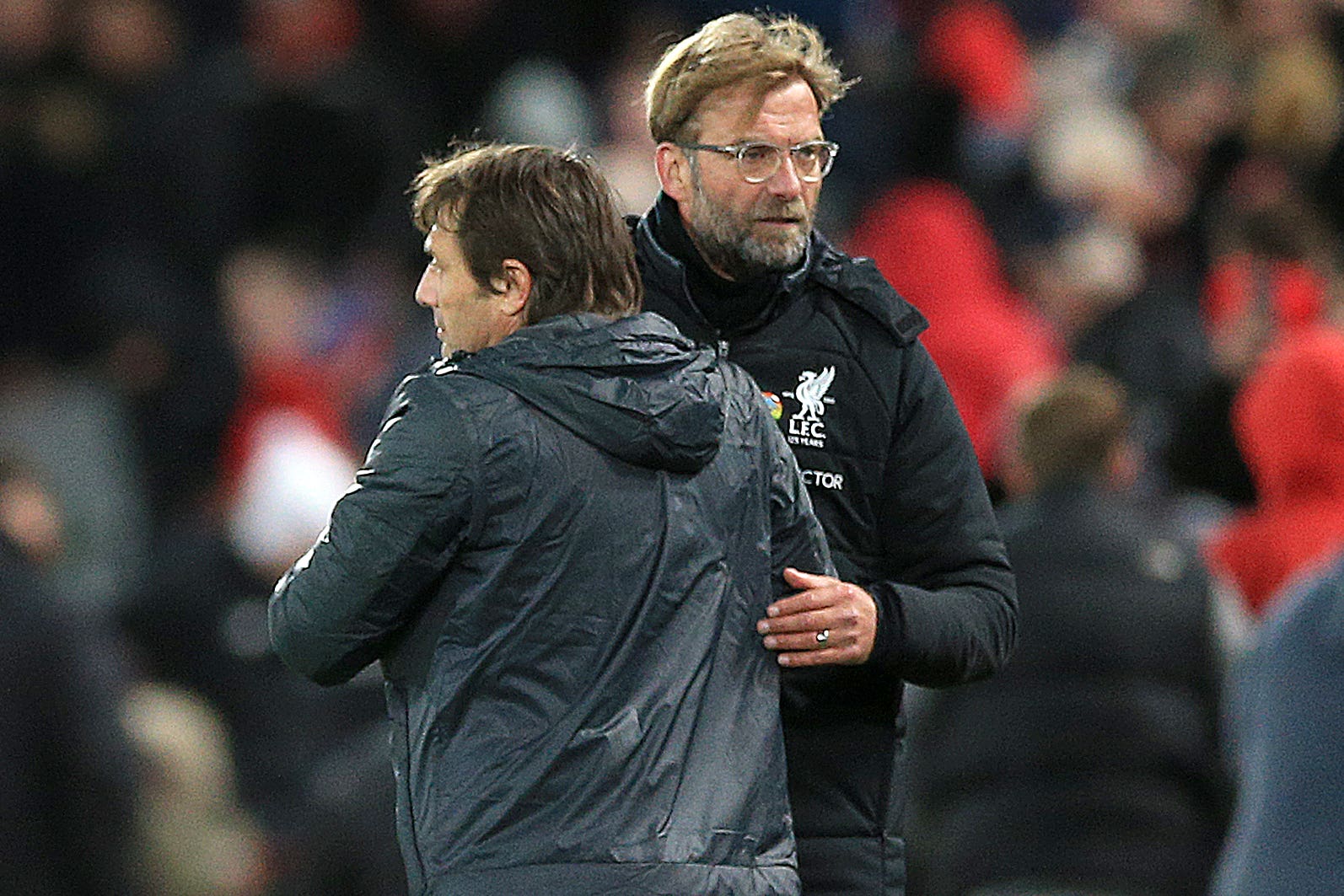 Jurgen Klopp and Antonio Conte will do battle at Tottenham Hotspur Stadium on Sunday (Peter Byrne/PA)