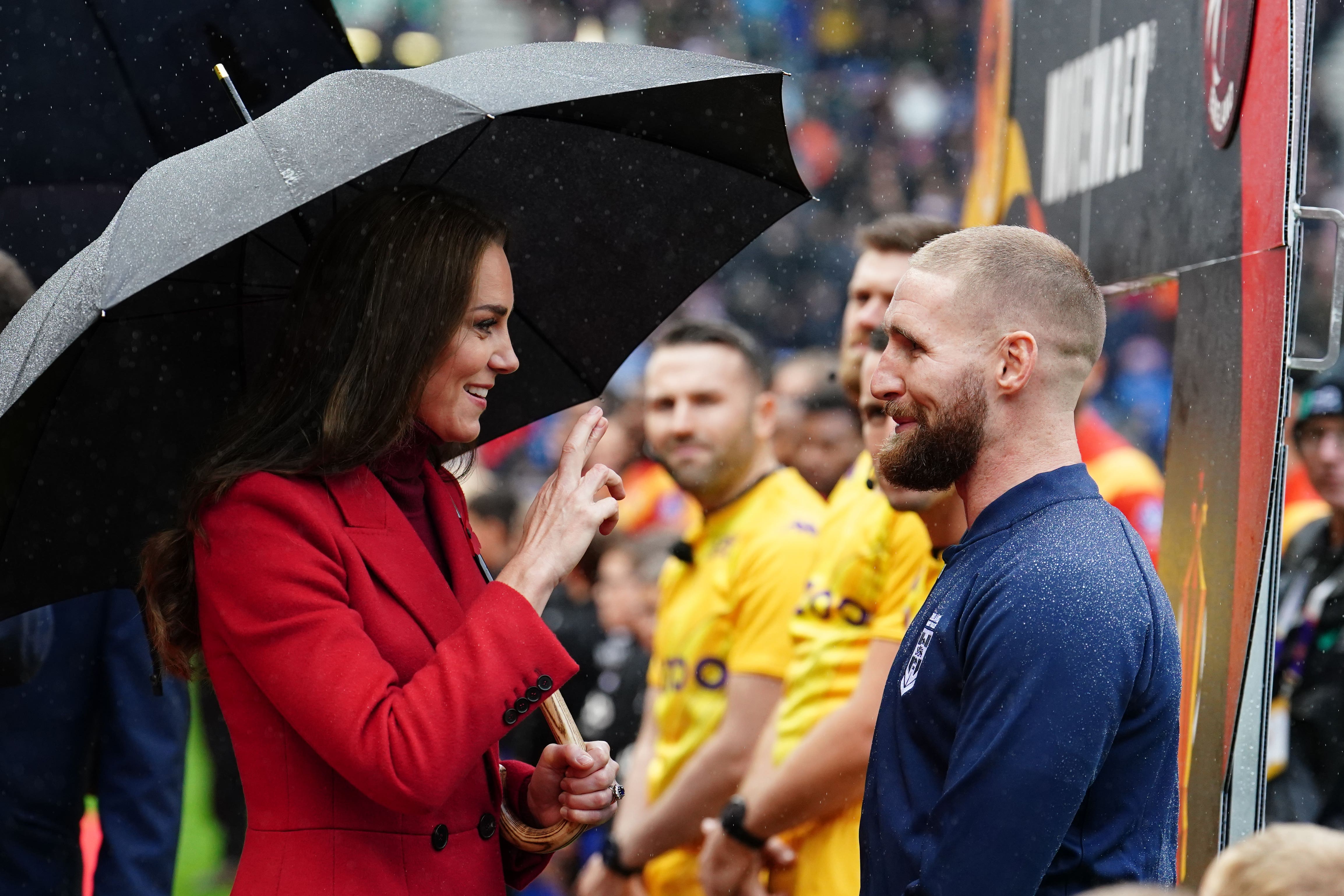 The Princess of Wales speaks to England’s Sam Tomkins before the Rugby League World Cup quarter final match (Tim Goode/PA)