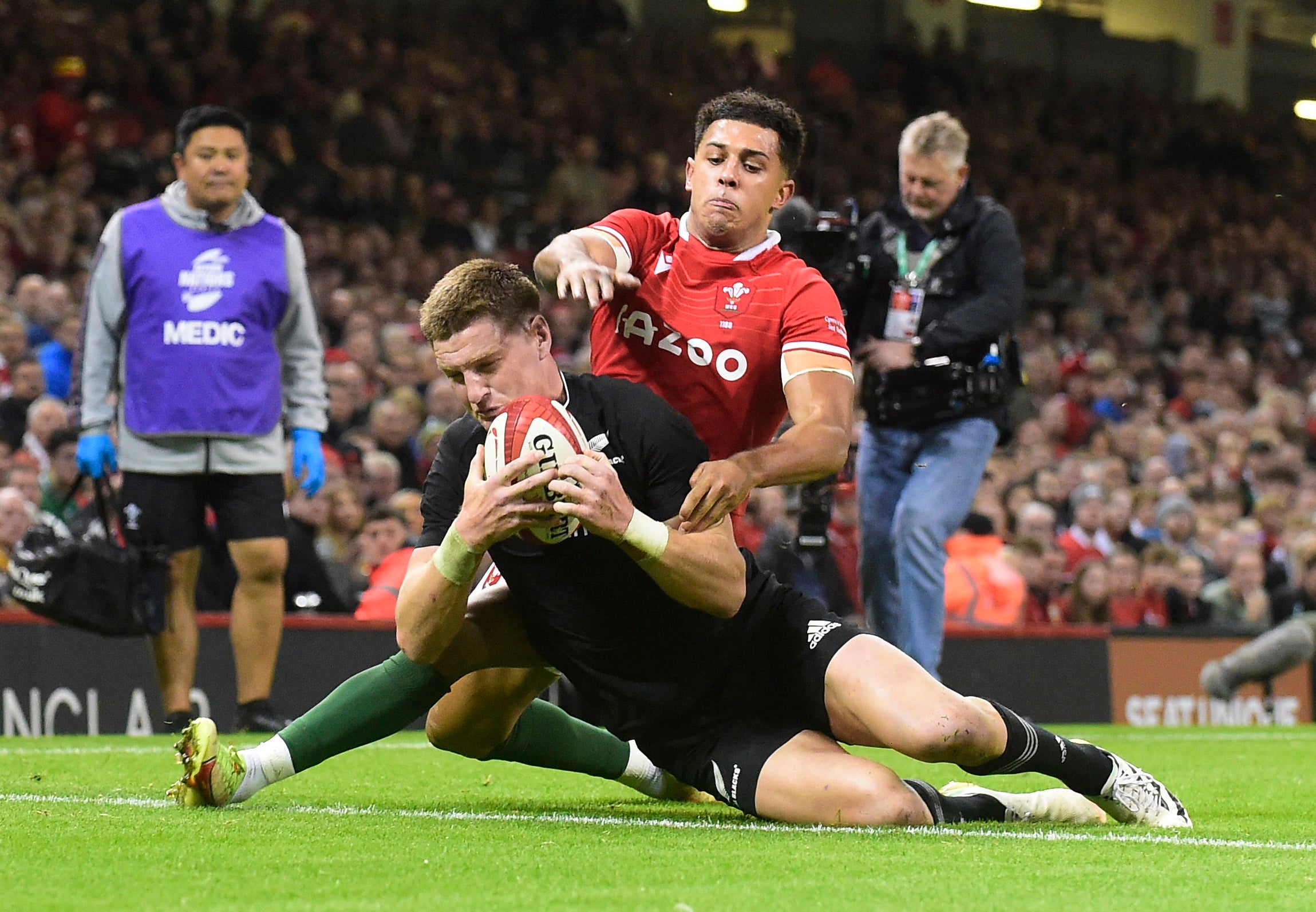 New Zealand's Jordie Barrett scores their third try