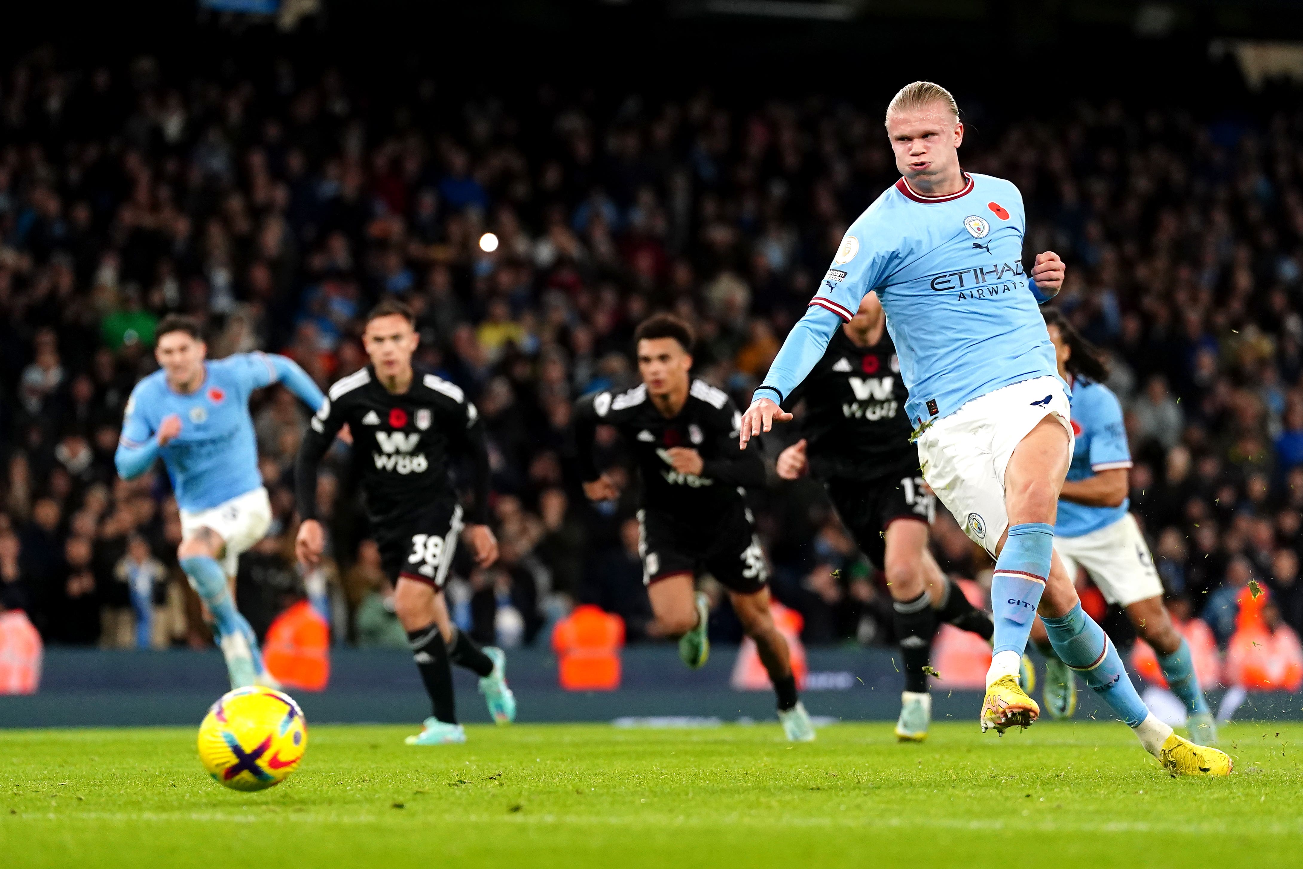 Erling Haaland scores from the spot to send his side back to the top of the Premier League