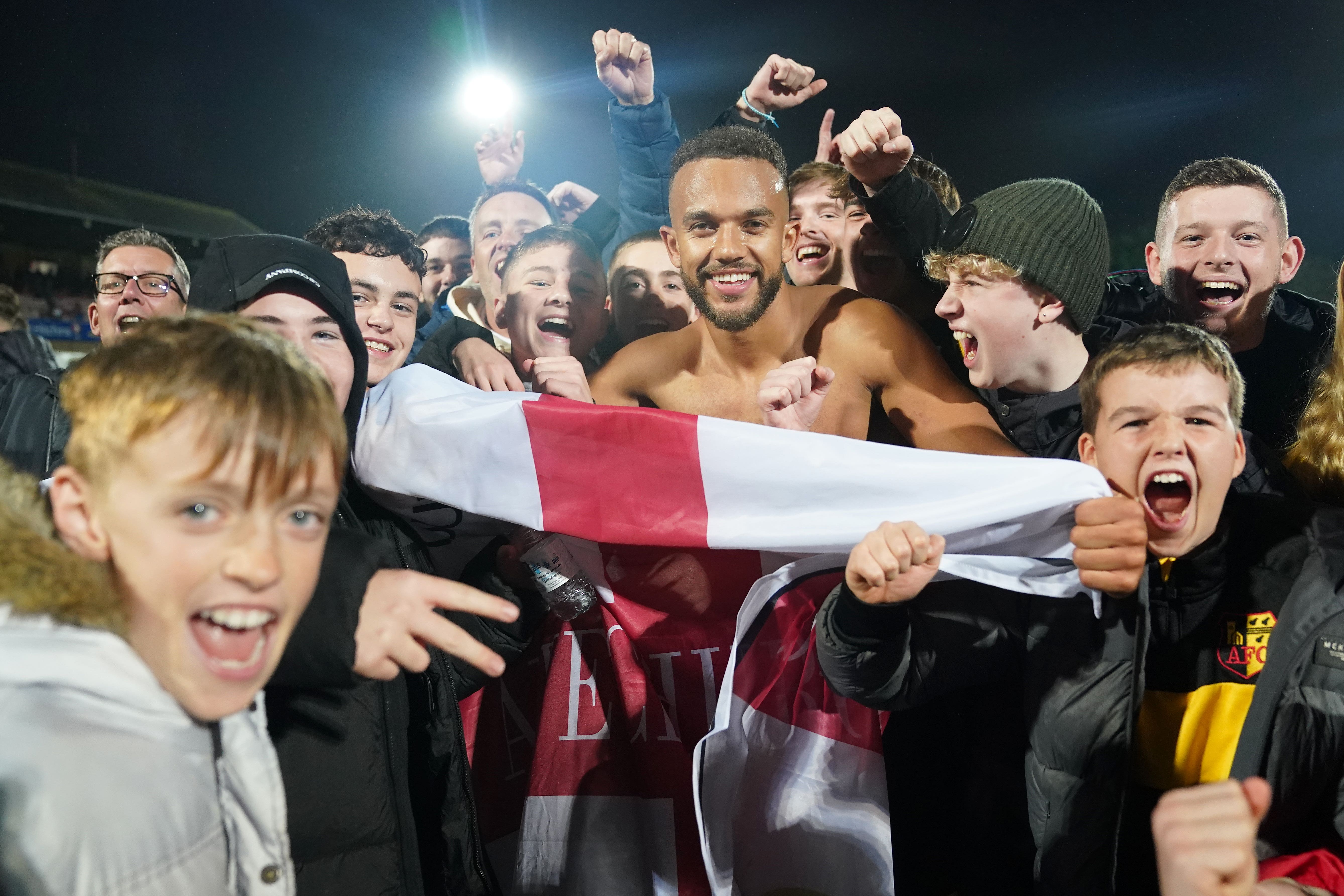 Alvechurch’s Danny Waldron celebrates with fans at the end of the FA Cup victory at Cheltenham (Adam Davy/PA).