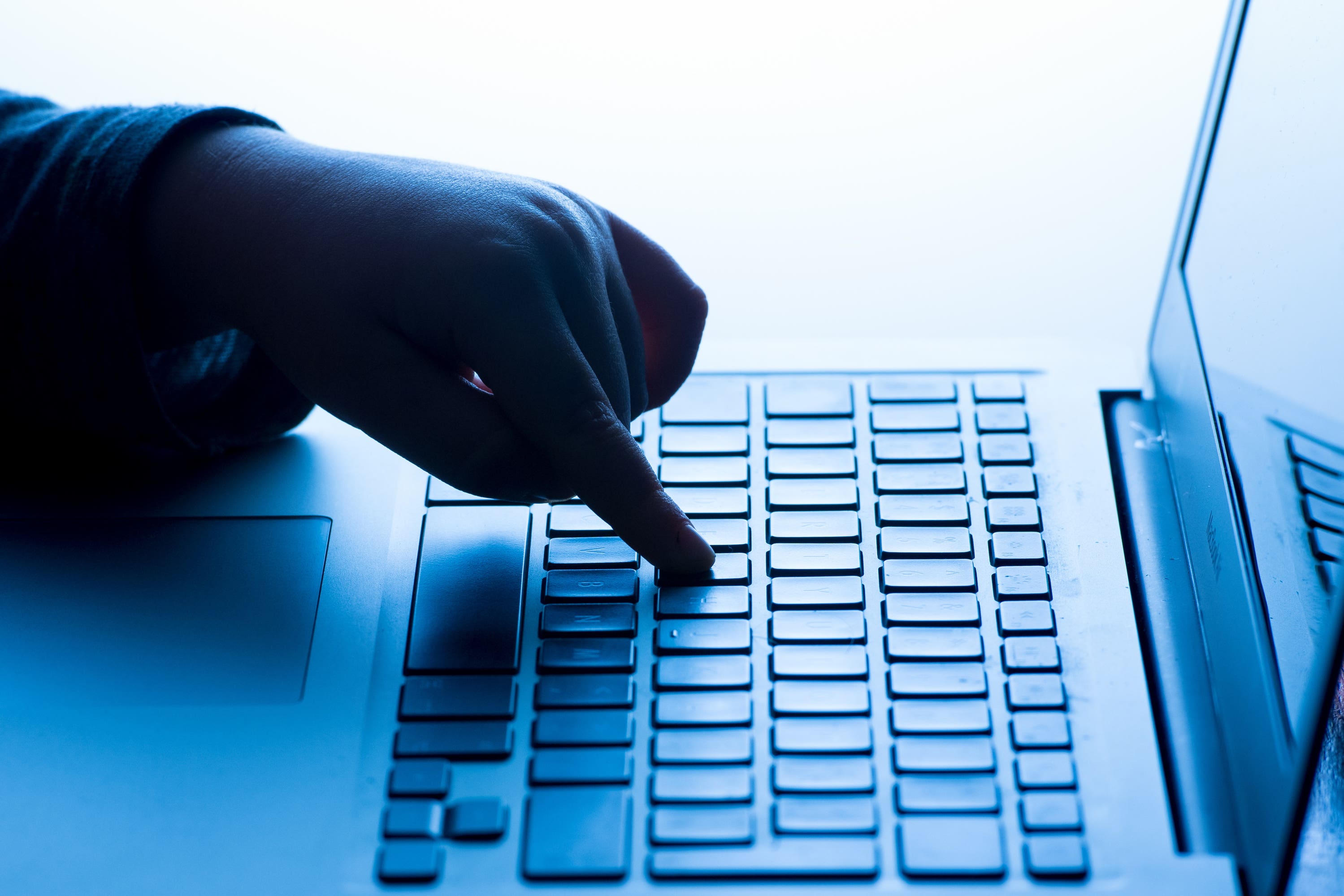 A child using a laptop computer (PA)