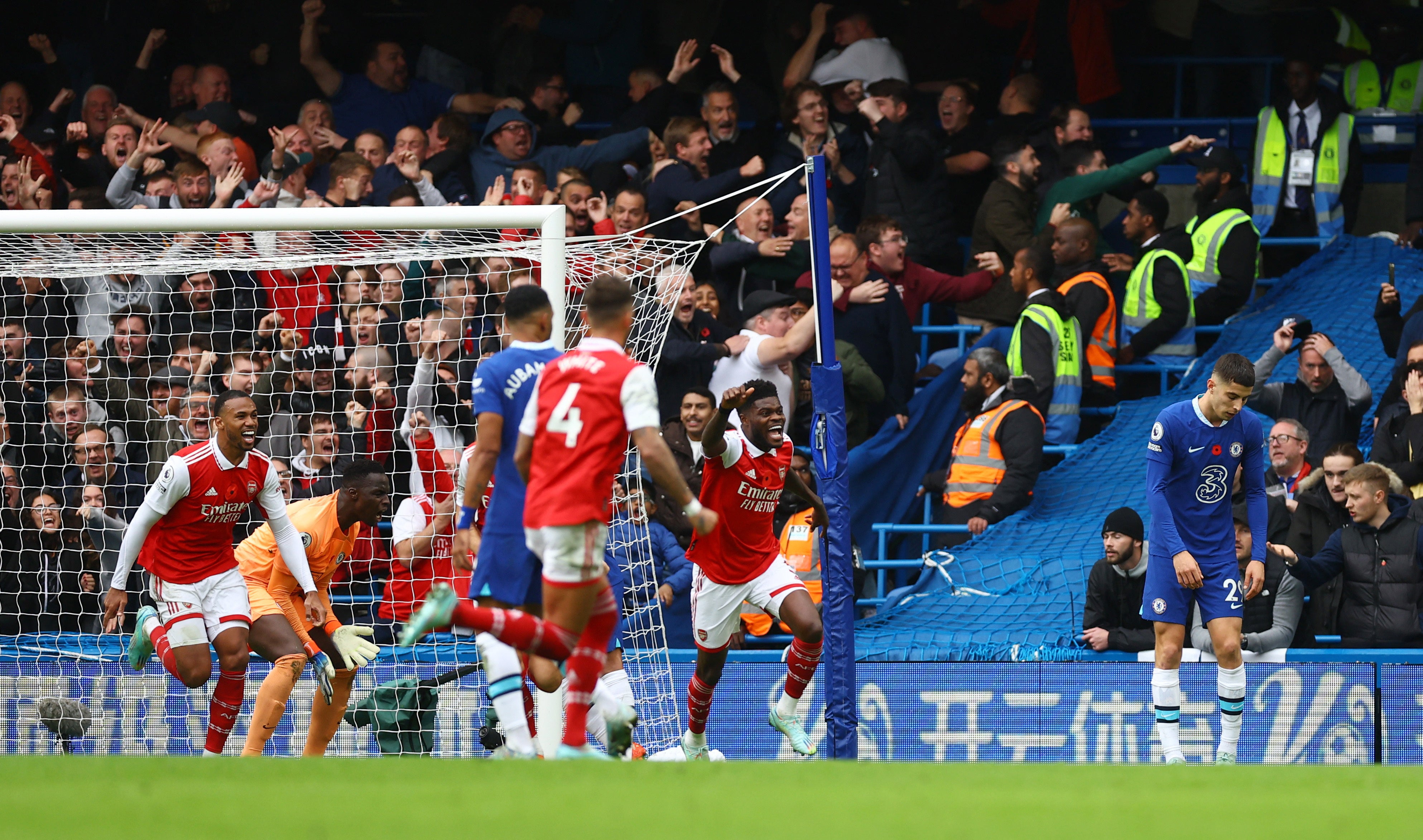 Arsenal celebrated a narrow win over their London rivals