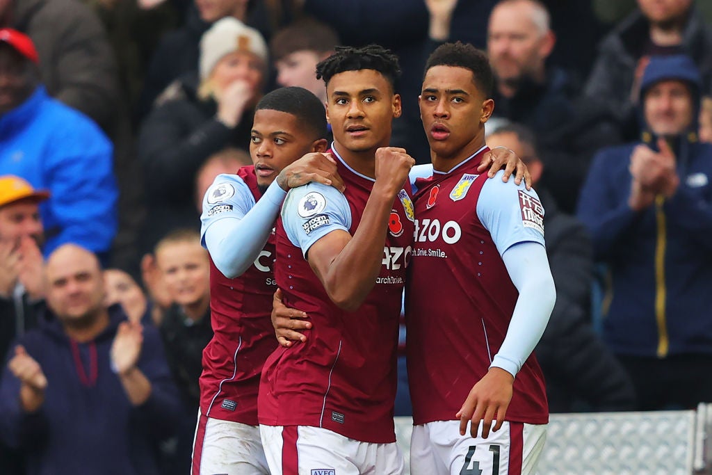 Jacob Ramsey (right) celebrates with Ollie Watkins and Leon Bailey after putting Aston Villa 3-1 ahead