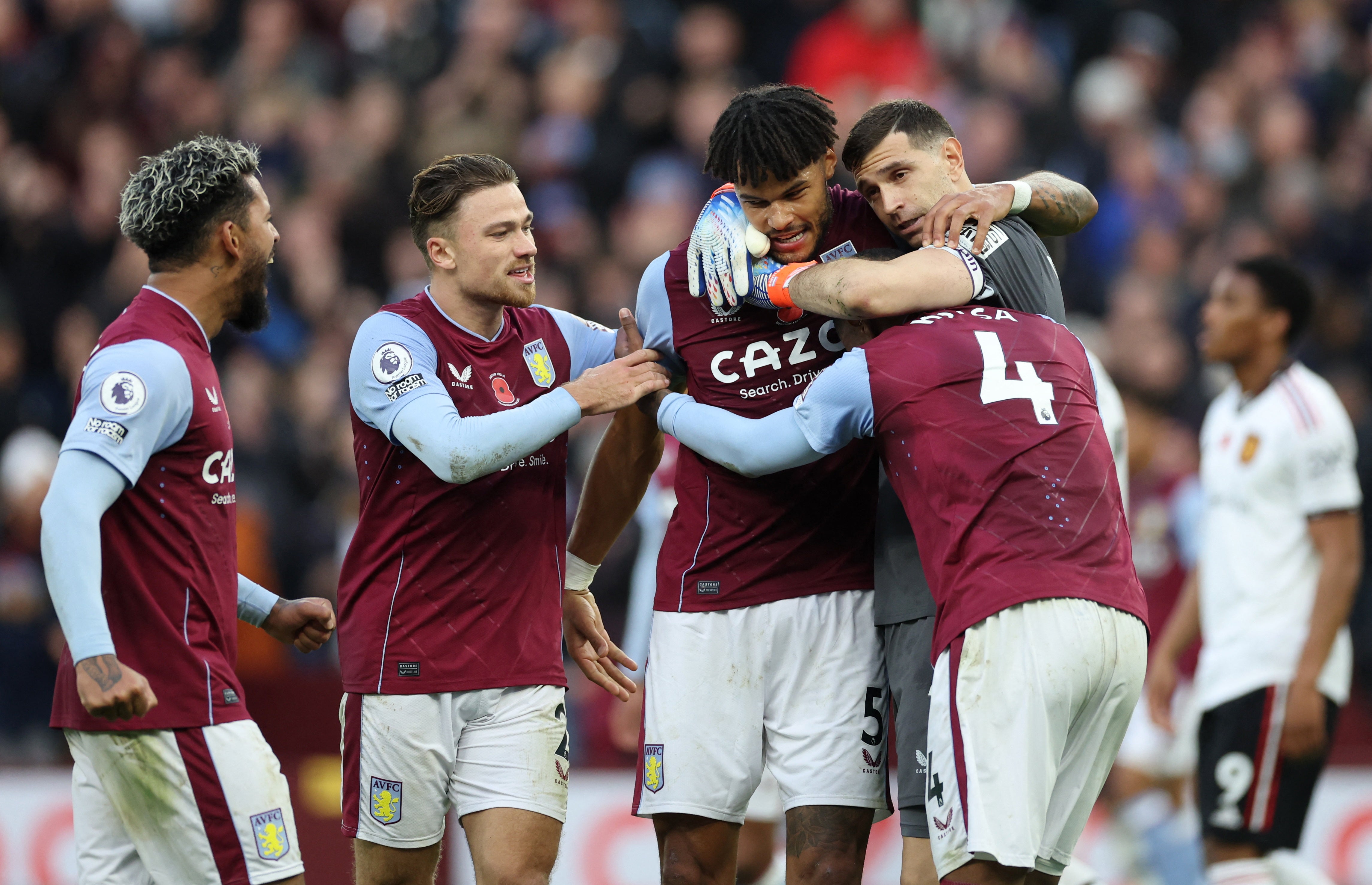 Aston Villa’s Douglas Luiz, Matty Cash, Ezri Konsa, Tyrone Mings and Emiliano Martinez celebrate after their 3-1 victory