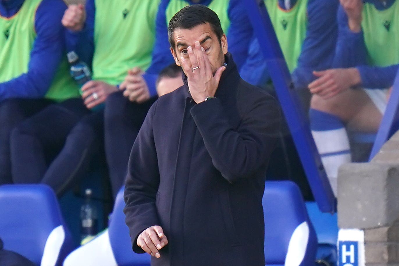 Giovanni van Bronckhorst watches through his fingers as Rangers lose in Perth (Jane Barlow/PA)