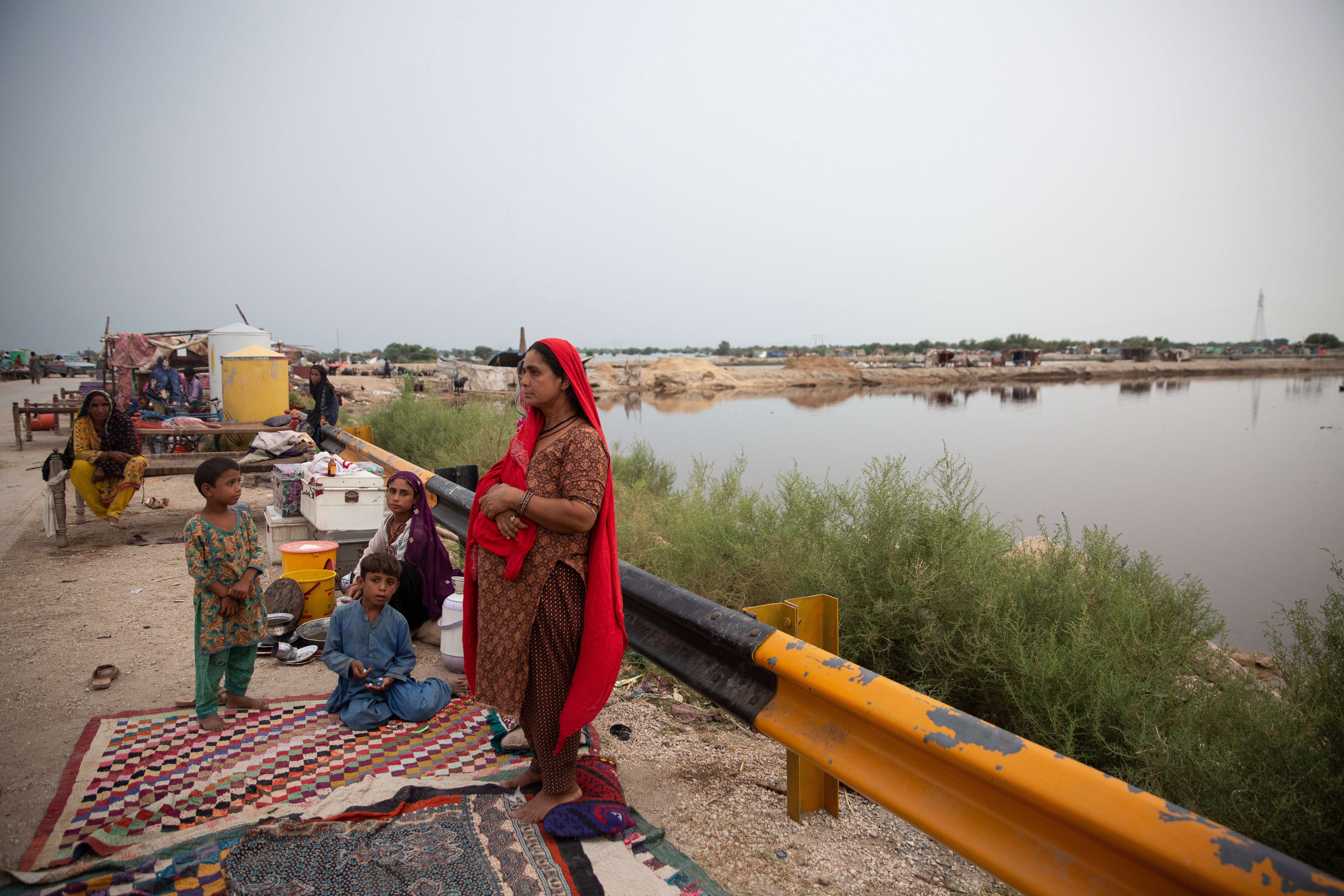 Families live in a makeshift camp for displaced people