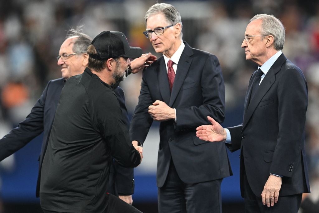 Klopp shakes hands with Liverpool owner John W Henry