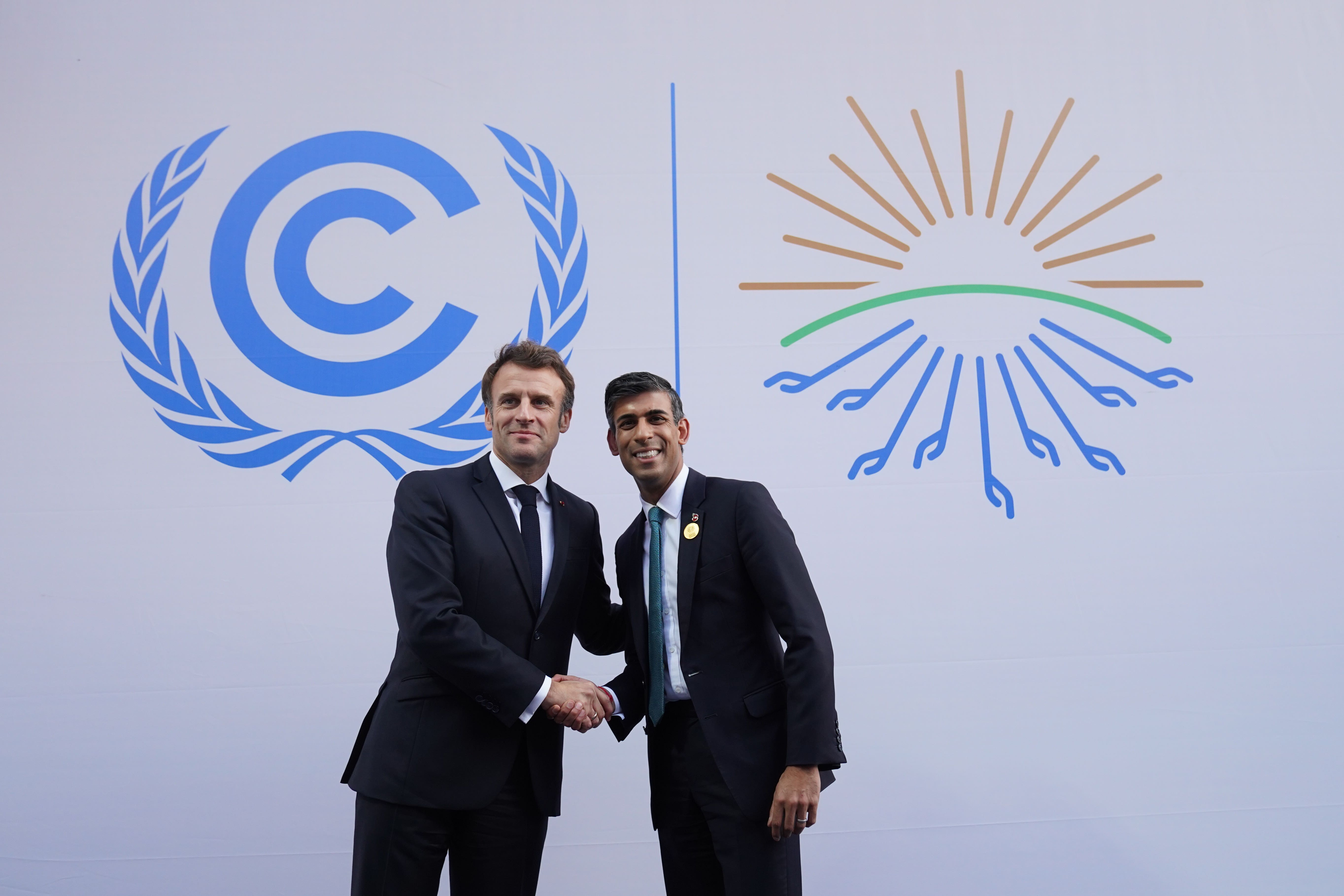 Emmanuel Macron and Rishi Sunak meet at Cop27 in Egypt (Stefan Rousseau/PA)