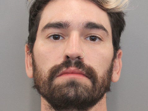 Man arrested for throwing can at Ted Cruz during Astros World Series parade