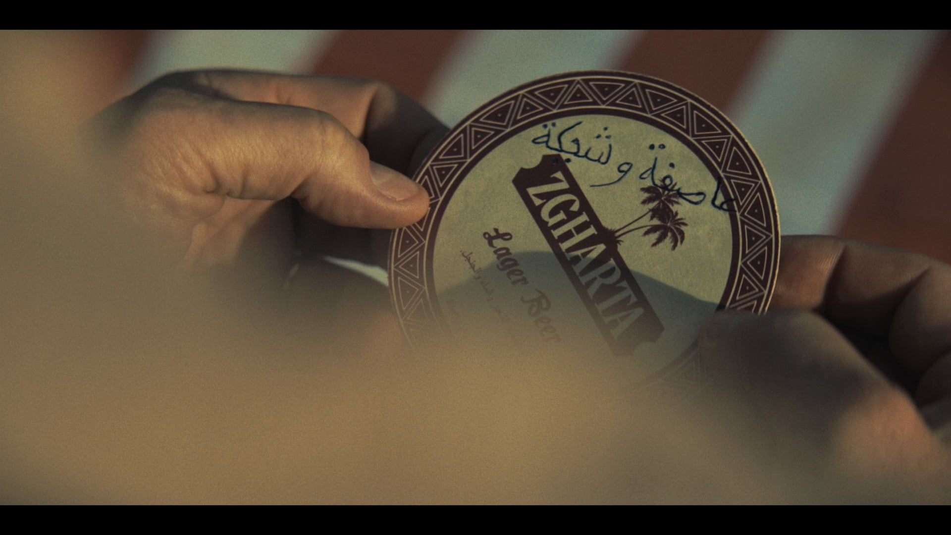 A message written on an innocuous beermat, gets vital information to an under-pressure Philby