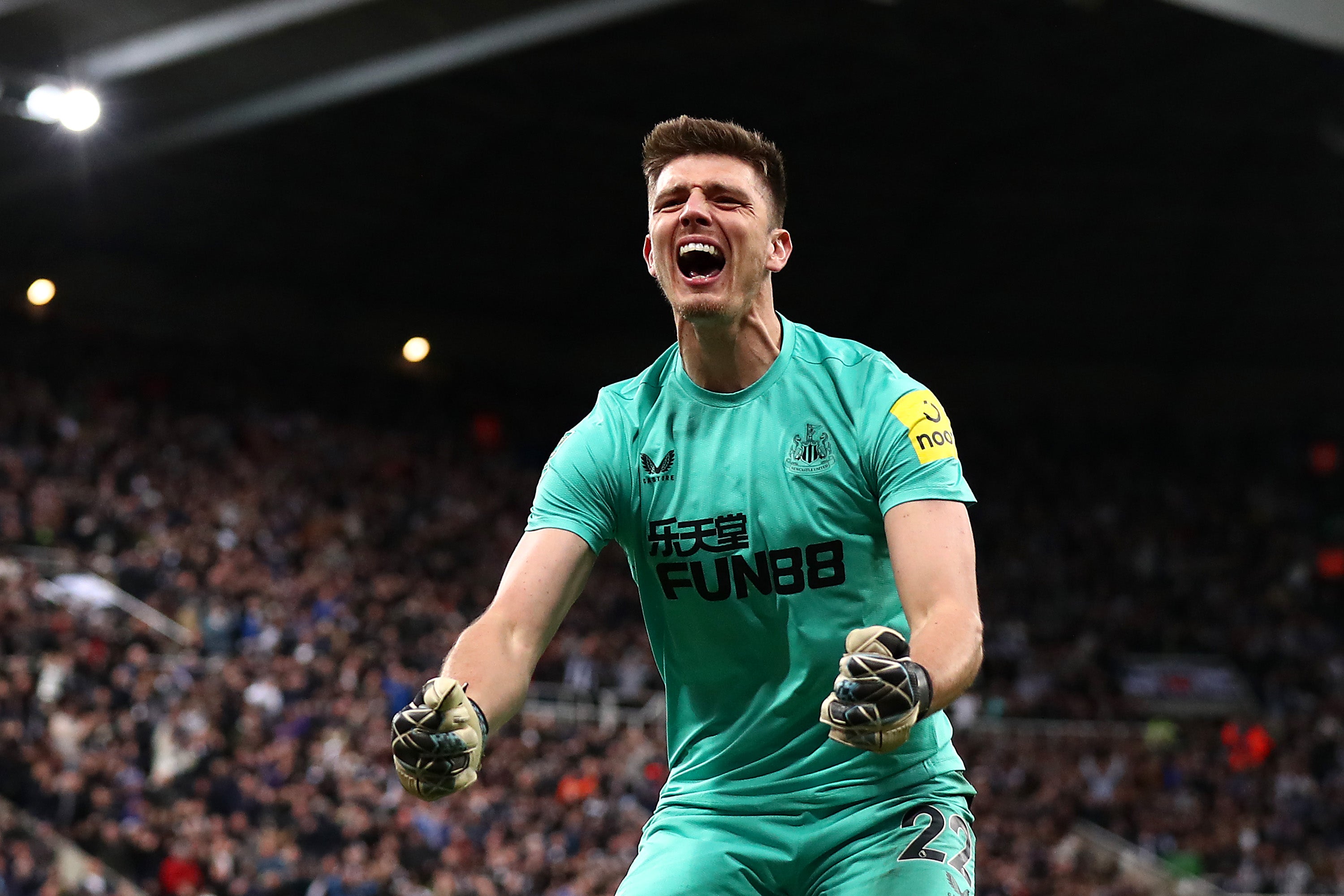 Nick Pope celebrates after saving three penalties