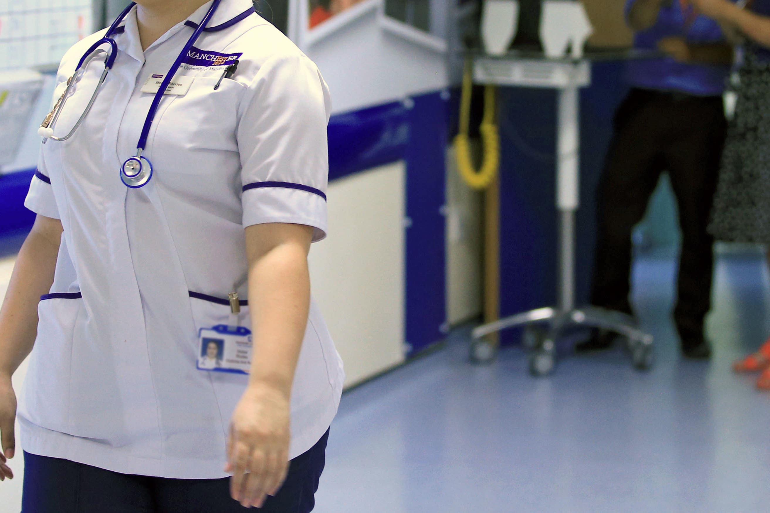 Nurses have urged the Government to get round the table and talk after they voted to take industrial action over pay (Peter Byrne/PA)