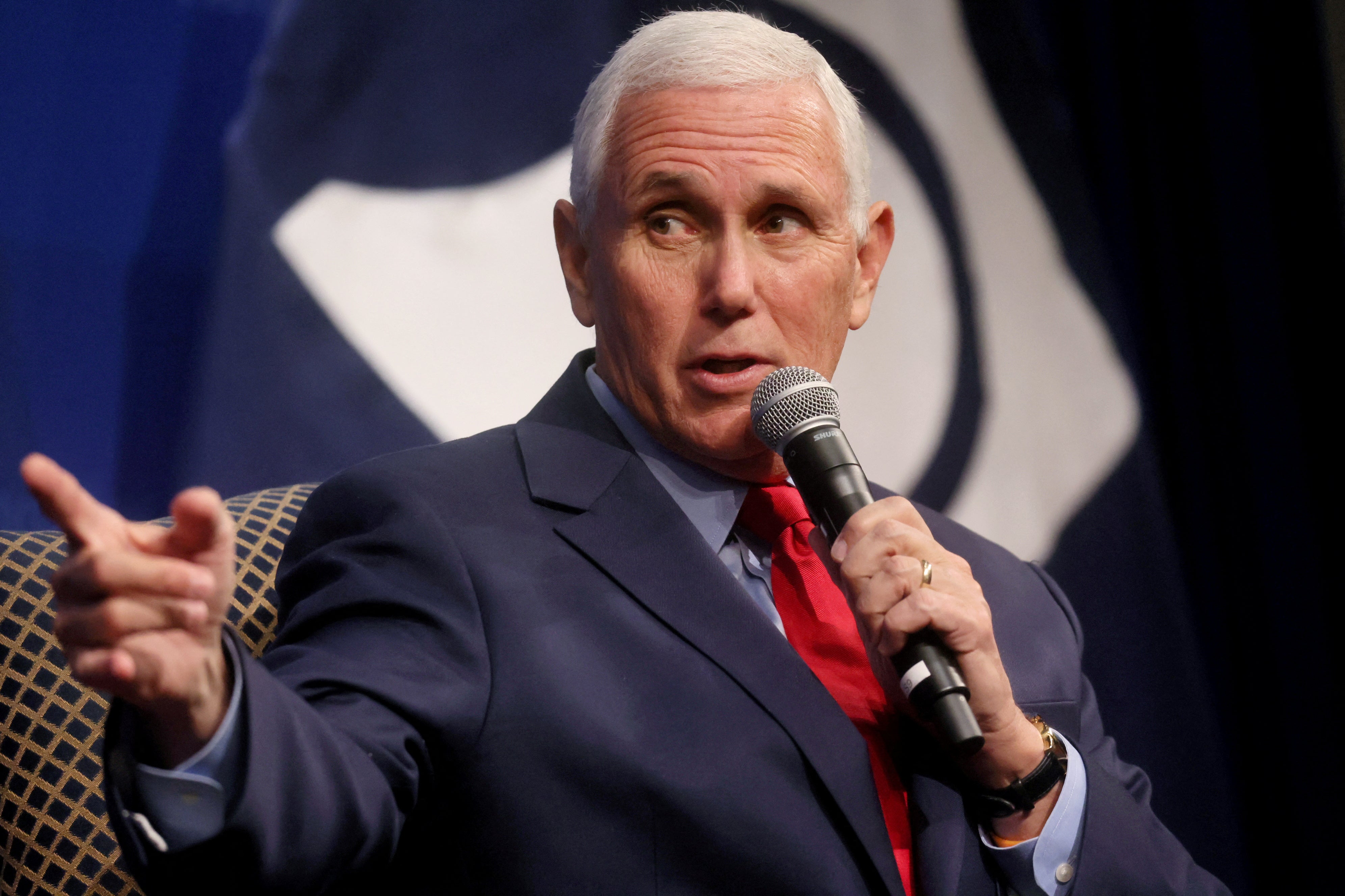 Former U.S. Vice President Mike Pence is interviewed by Kevin Roberts, president of the Heritage Foundation, in front of an audience at the Heritage Foundation in Washington