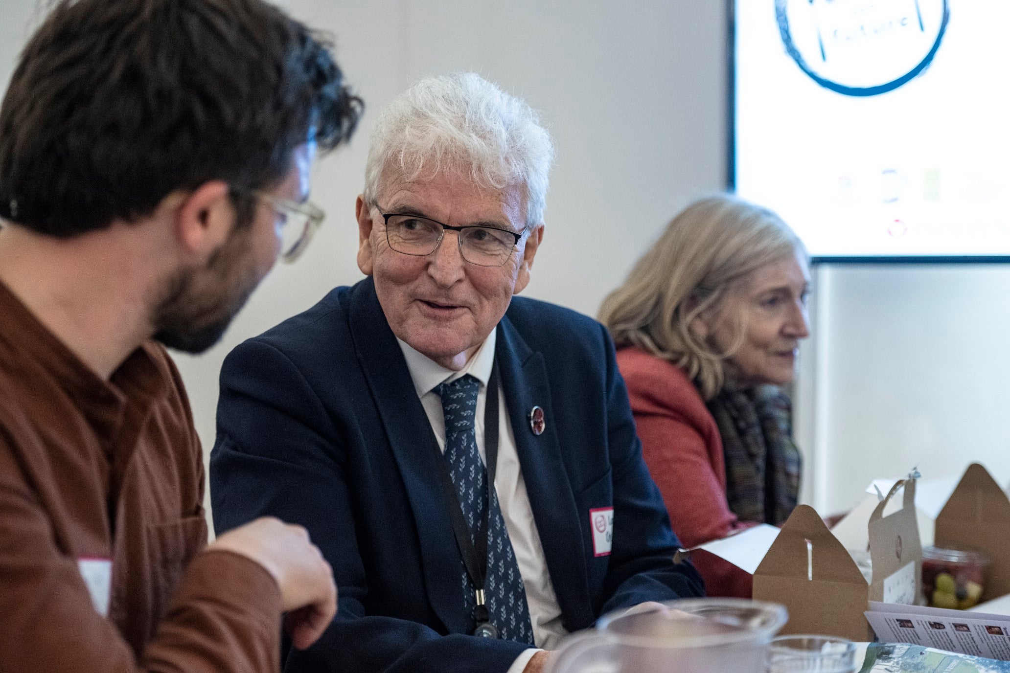 Lord Browne of Ladyton and Baroness Boycott eat a cold packed lunch during the Food Foundation event