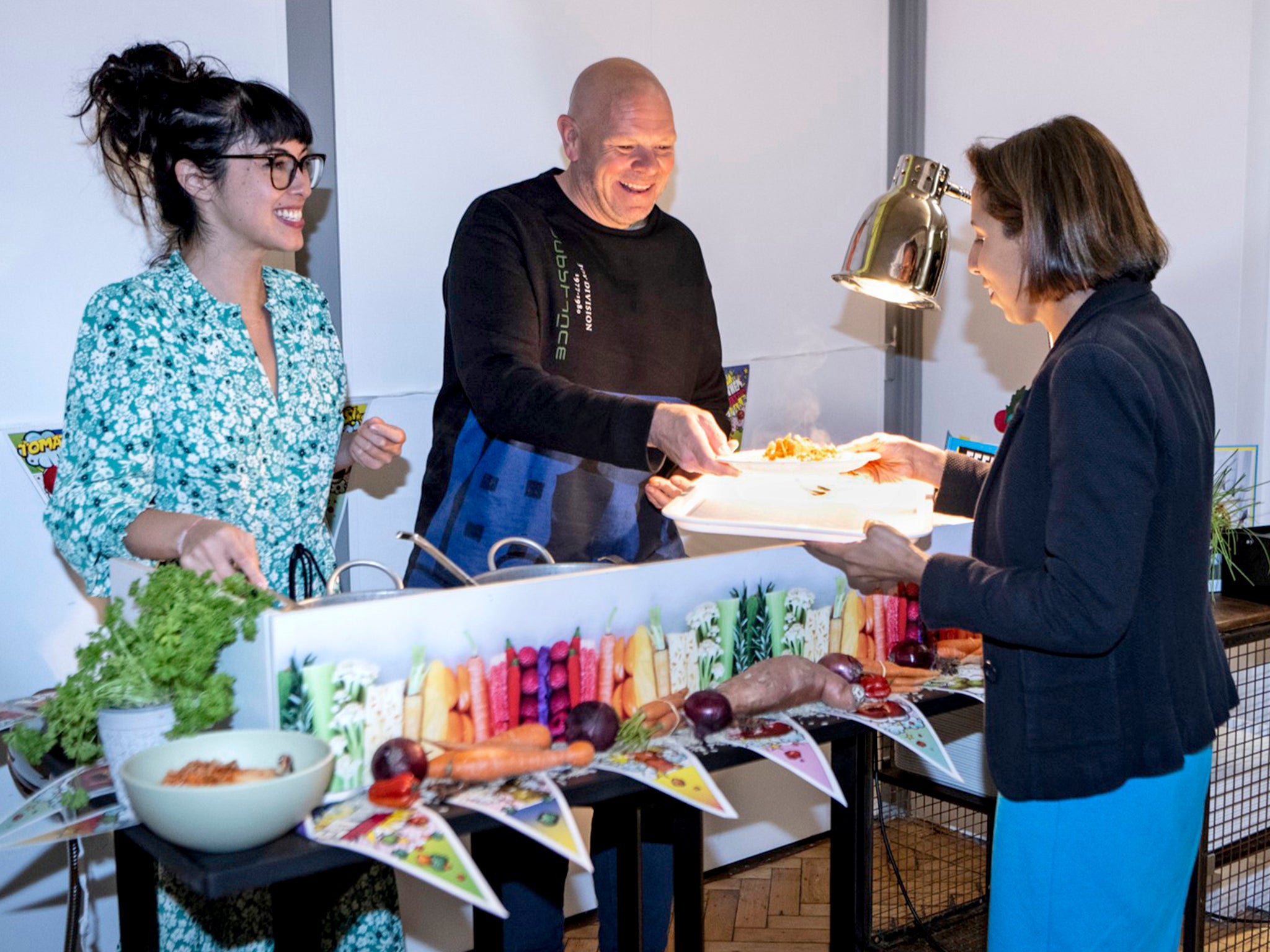 Chefs Melissa Hemsley and Tom Kerridge serve a hot meal to Lib Dem MP Munira Wilson in Westminster