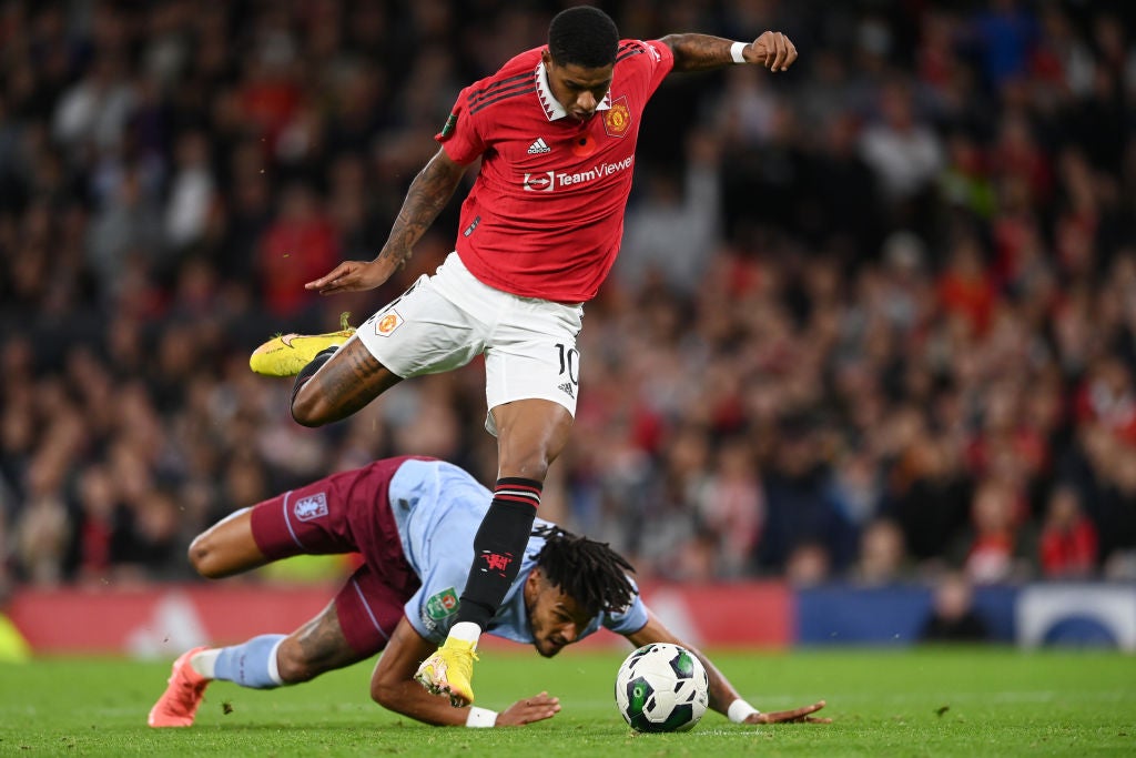 Rashford drives past Tyrone Mings for United’s second equaliser