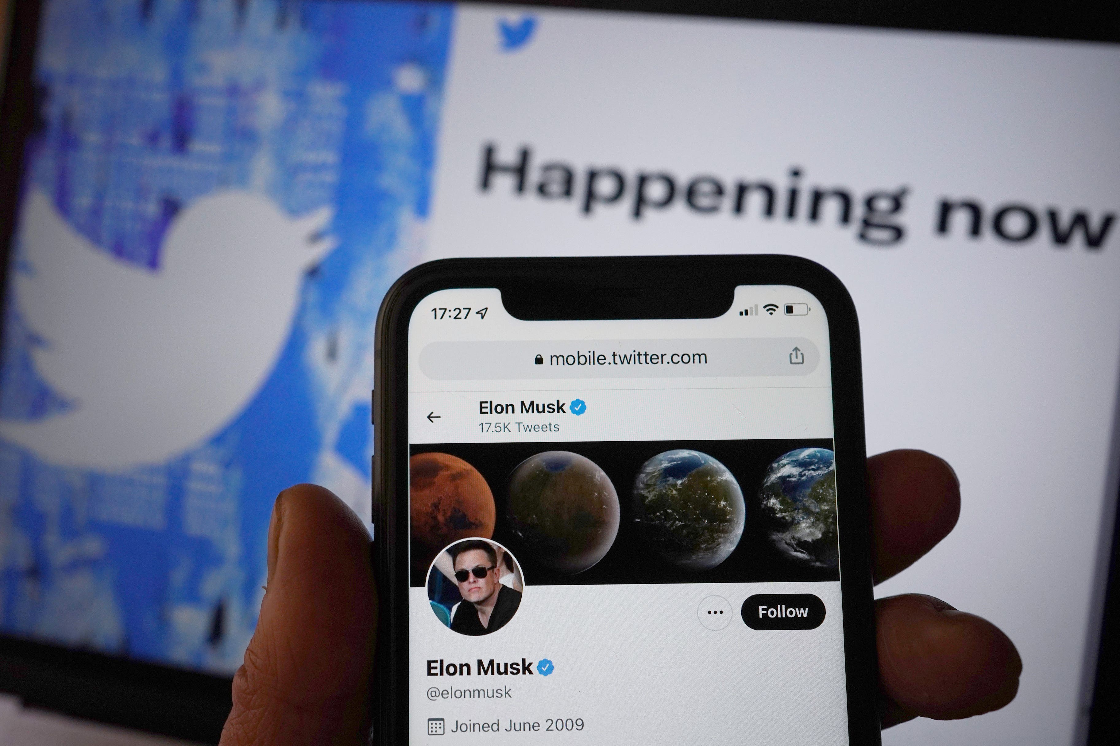 The Twitter social media app showing Elon Musk running on a mobile phone (PA)