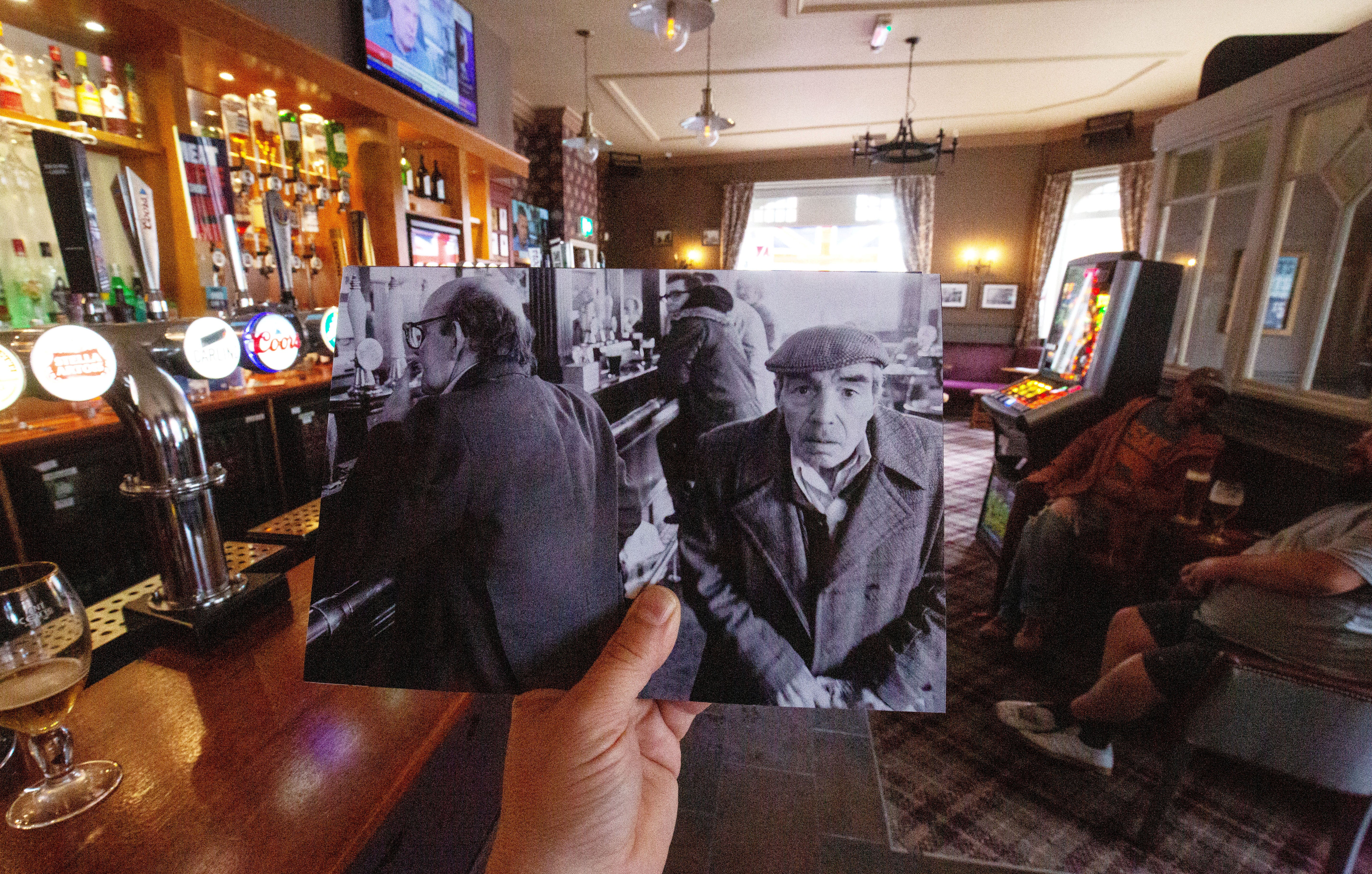 Eddie Cliff walks past Tommy Harding in 1983