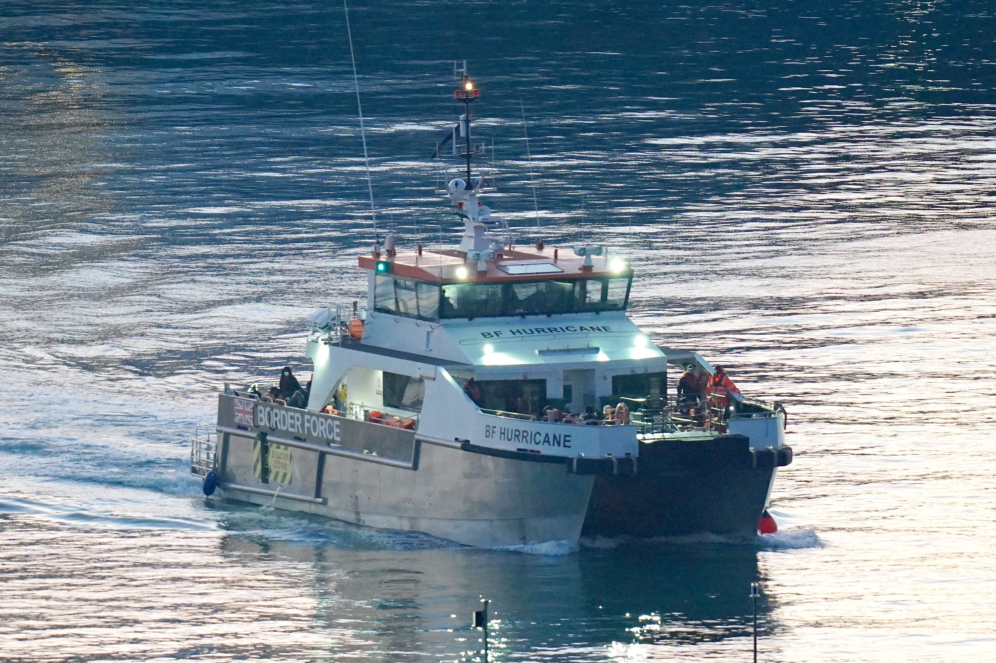 Groups of people are brought into Dover on board a Border Force vessel