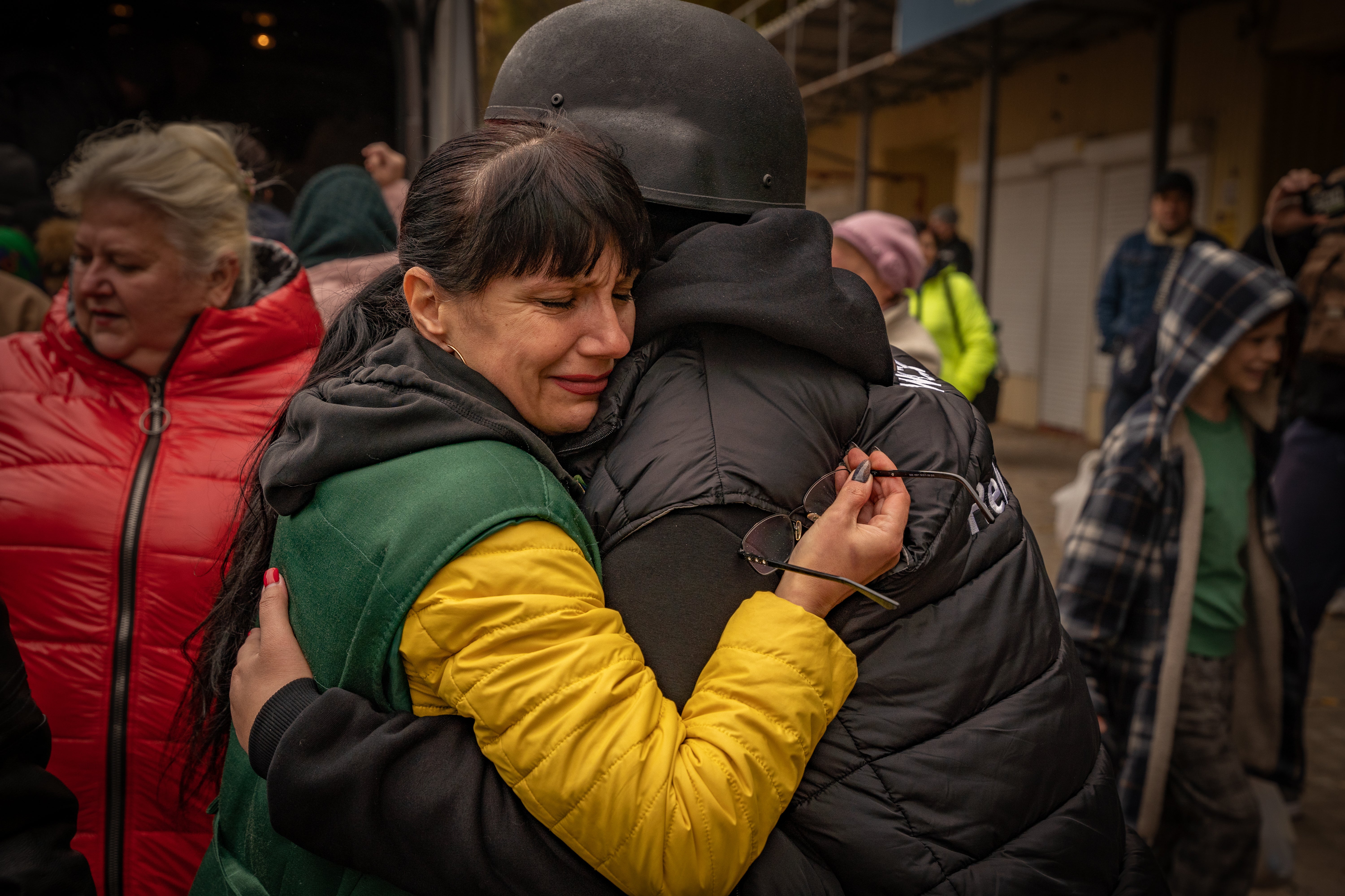 A woman in tears hugs WCK’s regional coordinator, Yuliya Konovalova